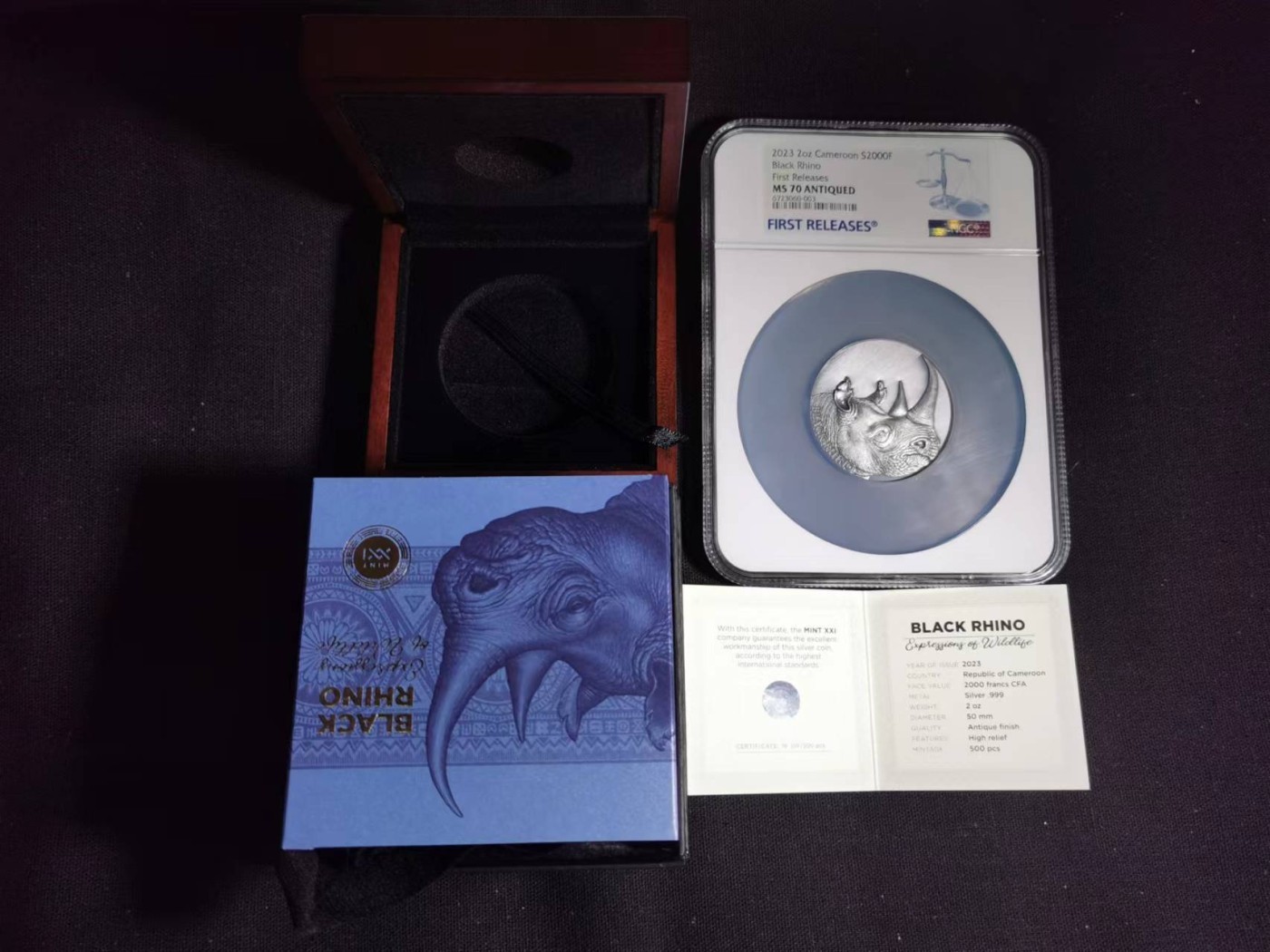 刘世昌艺术品销售中心～虎踞龙蟠*金杨在线联拍群第504期  喀麦隆2023年野生动物～犀牛2000法郎2盎司仿古纪念银币“首期”（NGC MS70ANT 串号：6723060-003）1枚，原盒证。发行量：500枚。