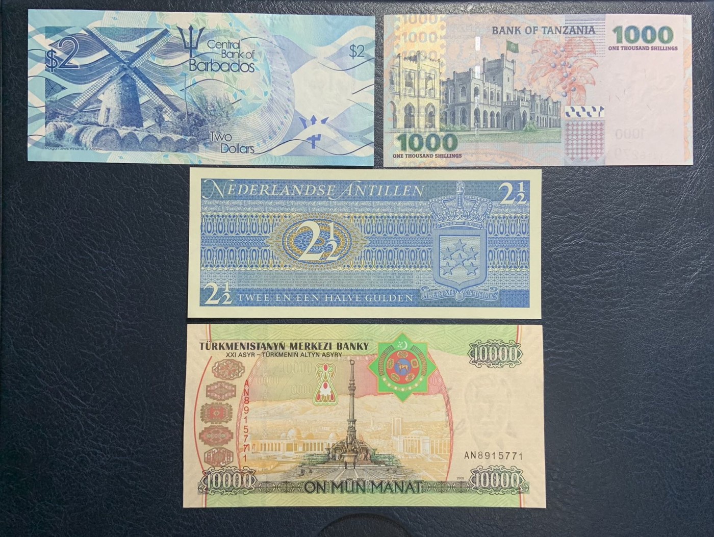 收藏联盟Quantum Auction 第314期拍卖  巴巴多斯2元，坦桑尼亚1000先令，荷属安德列斯以及土库曼斯坦2005年10000马纳特 品相全新UNC 巴巴多斯边角微瑕
