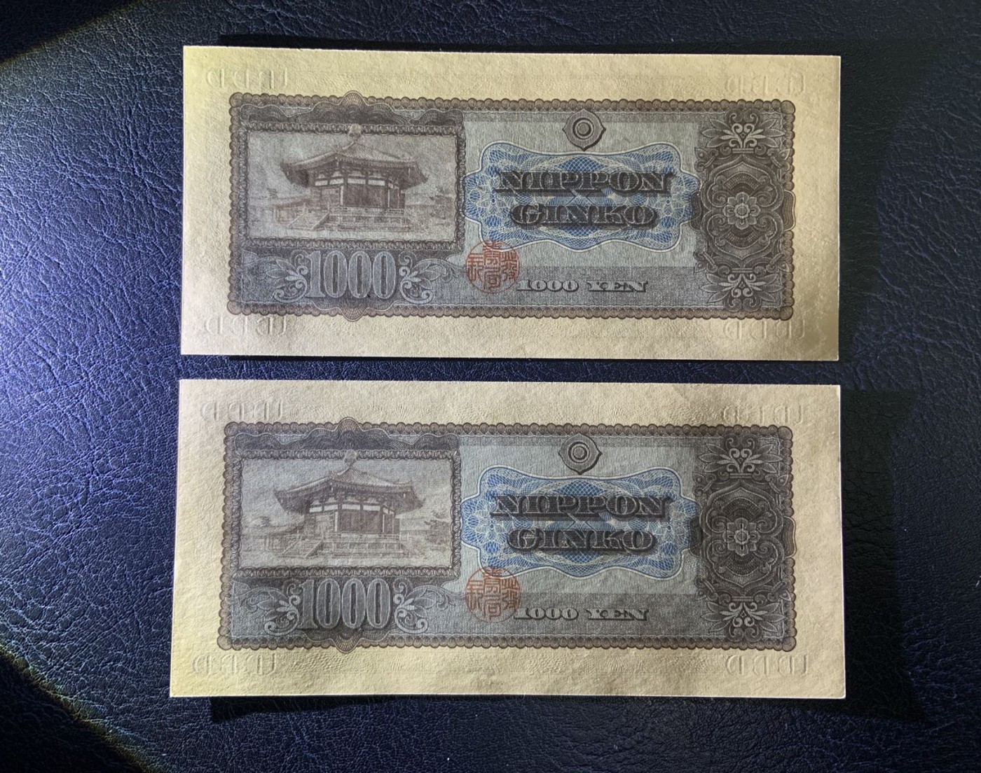 收藏联盟Quantum Auction 第314期拍卖  日本1950年1000日元两连号 品相全新UNC 其中一张为乱蛇号