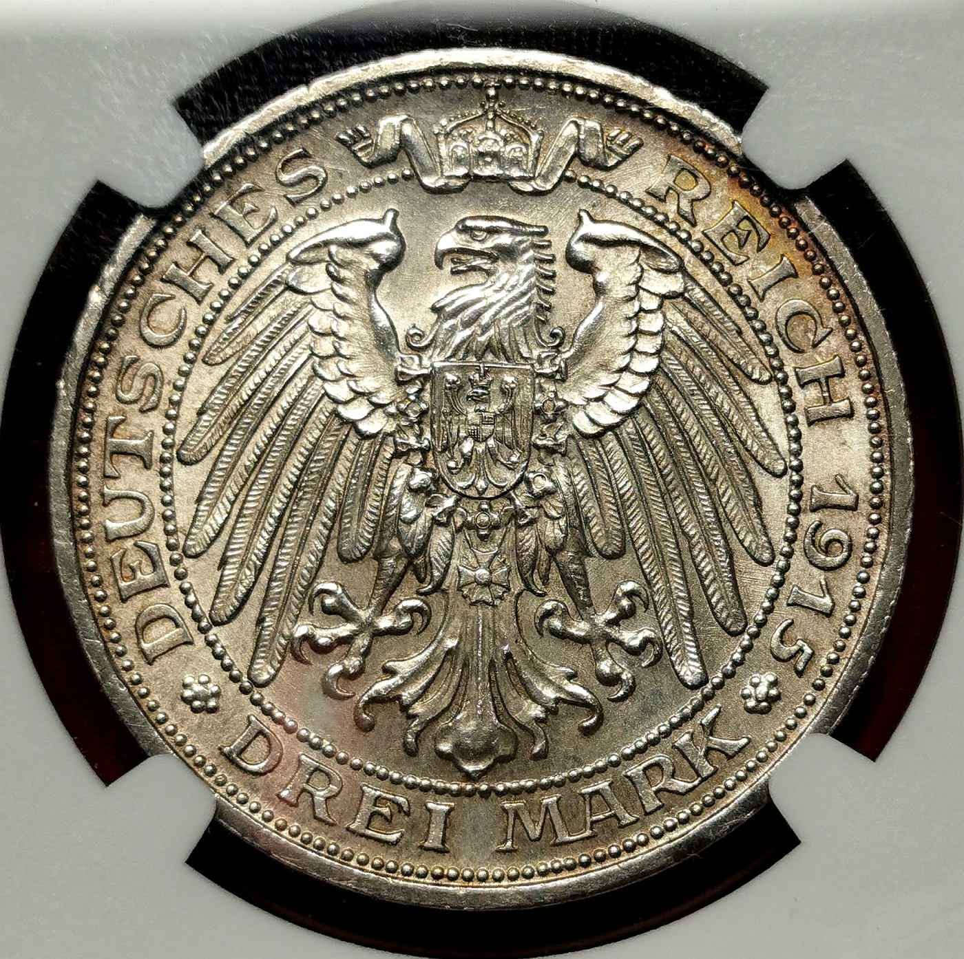 凡希万国世界钱币年度大拍第二季 NGC UNCD 1915曼斯菲尔德屠龙3马克 20世纪最稀少的马克之一，实物灰彩无肉眼可见瑕疵。