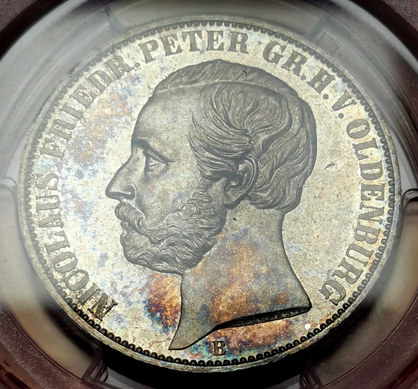 凡希万国世界钱币年度大拍第二季 PCGS MS63 1860德国欧登堡流通纹章1泰勒 难度相当大的小邦流通泰勒，书价极高的品种，原味带彩，PC更高分只有一枚。