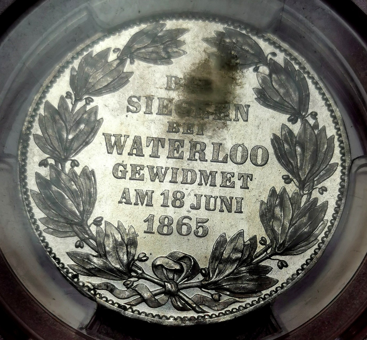 凡希万国世界钱币年度大拍第二季 PCGS MS64 1865汉诺威滑铁卢战役纪念1泰勒 发行量15000枚 一说用于奖励参加过滑铁卢战役的老兵 拥有非常强烈的镜面凝霜感