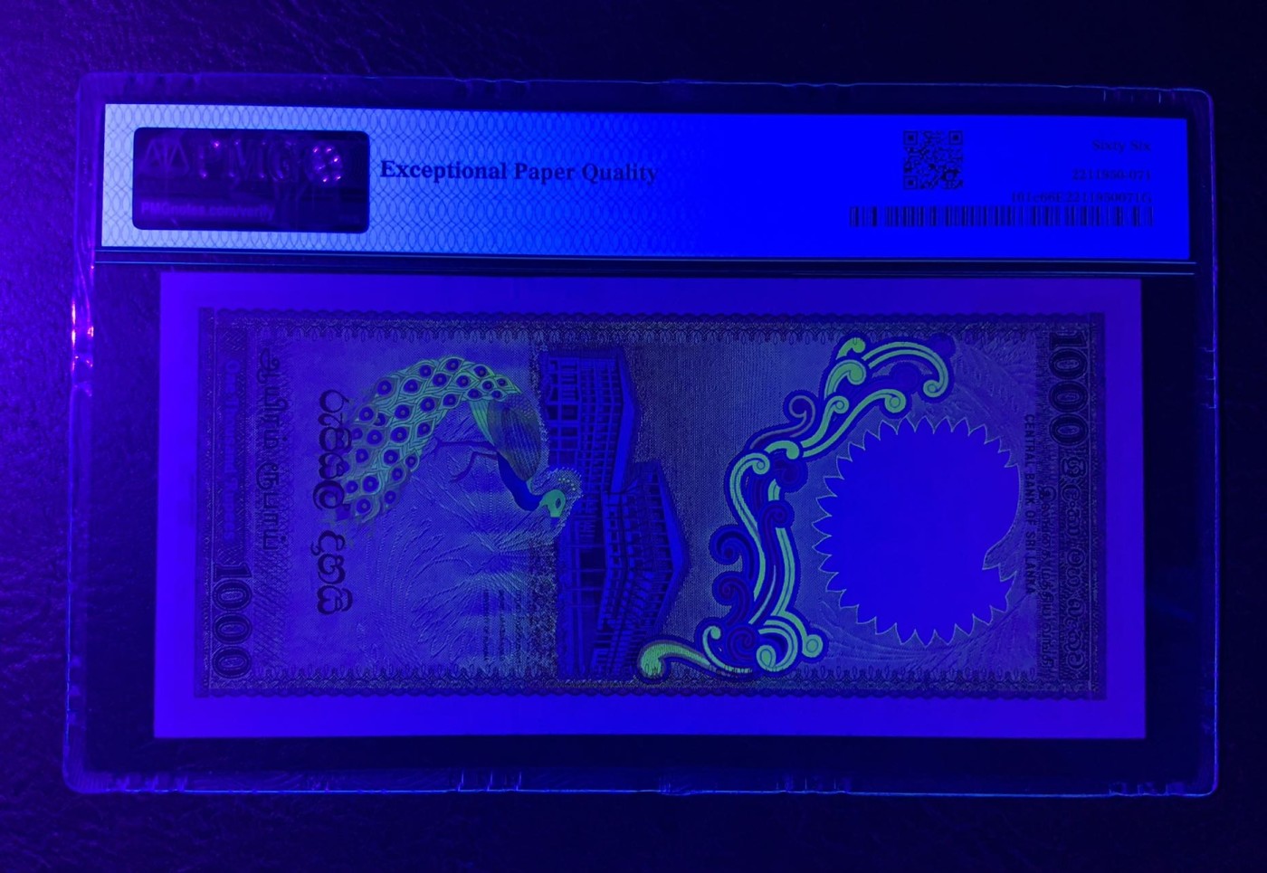 收藏联盟Quantum Auction 第315期拍卖  斯里兰卡1990年1000卢比 PMG66 荧光孔雀王