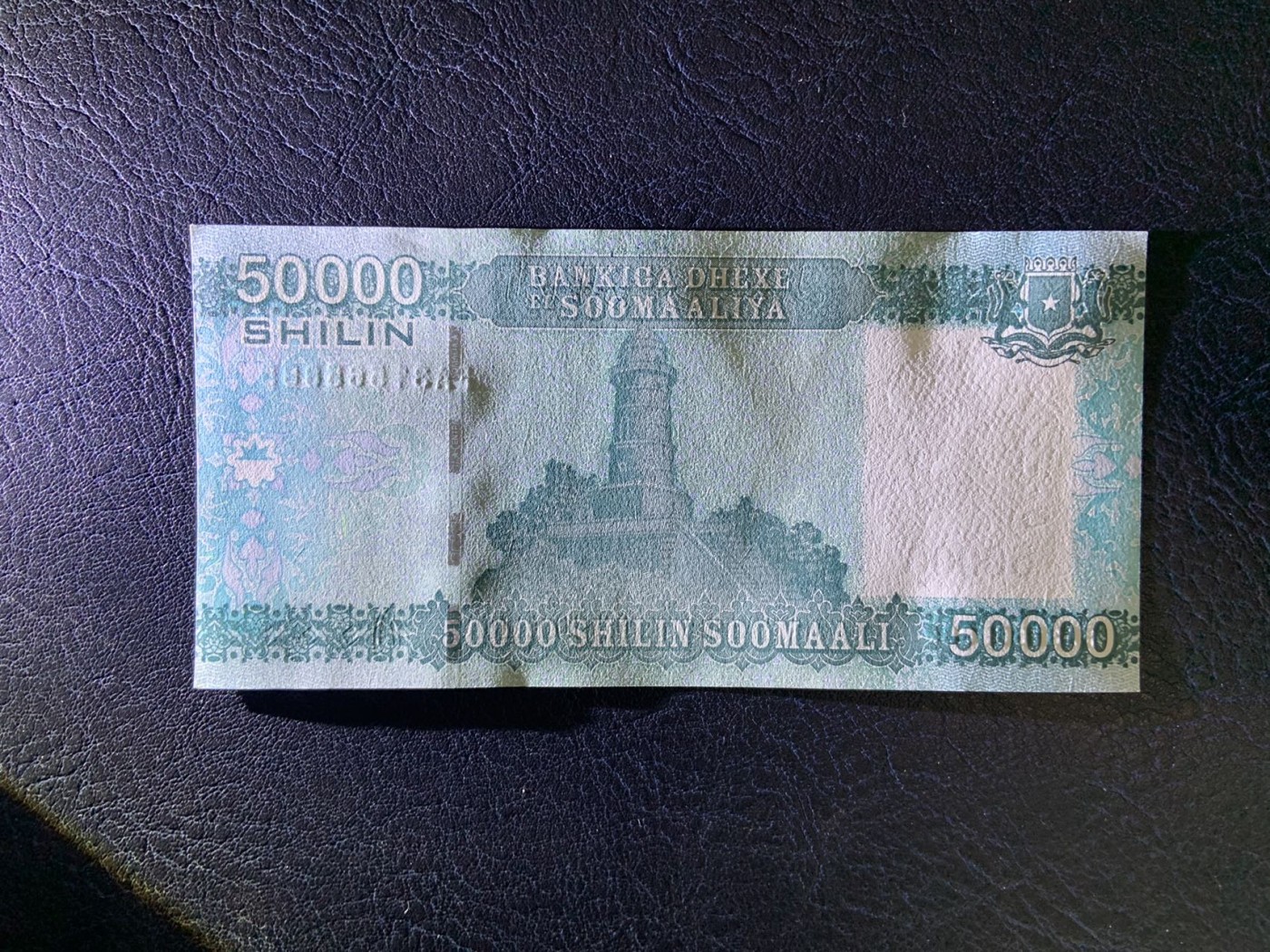 收藏联盟Quantum Auction 第315期拍卖  索马里2010年50000先令未发行版 品相全新UNC FA首发冠 因战乱而未发行 国内少见