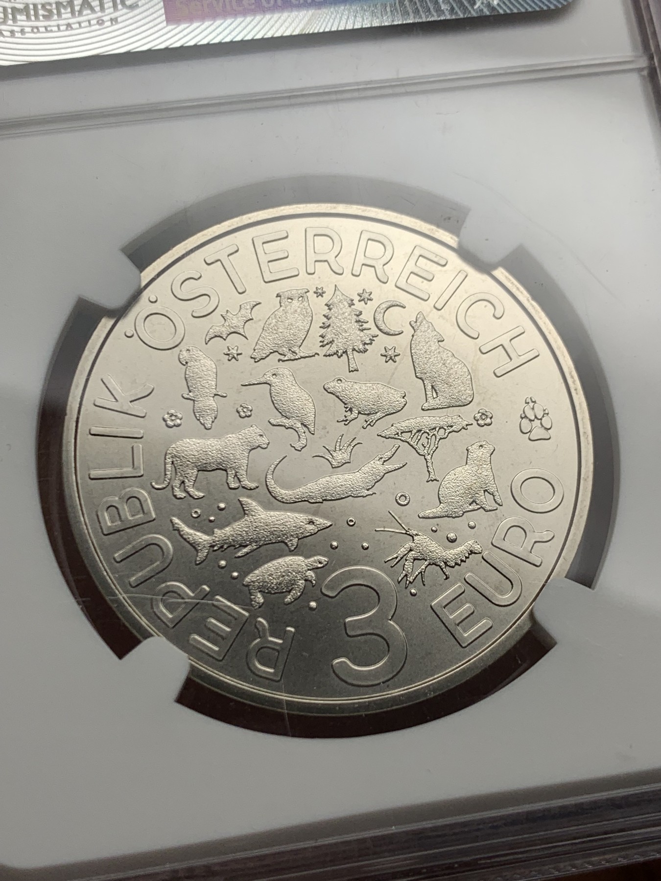 《竞宝斋》第232场-周日，周一 2场 (全场包邮) NGC MS69 奥地利2018年五颜六色的生物之鹦鹉 首发纪念币 3欧元 发行量世界50000枚