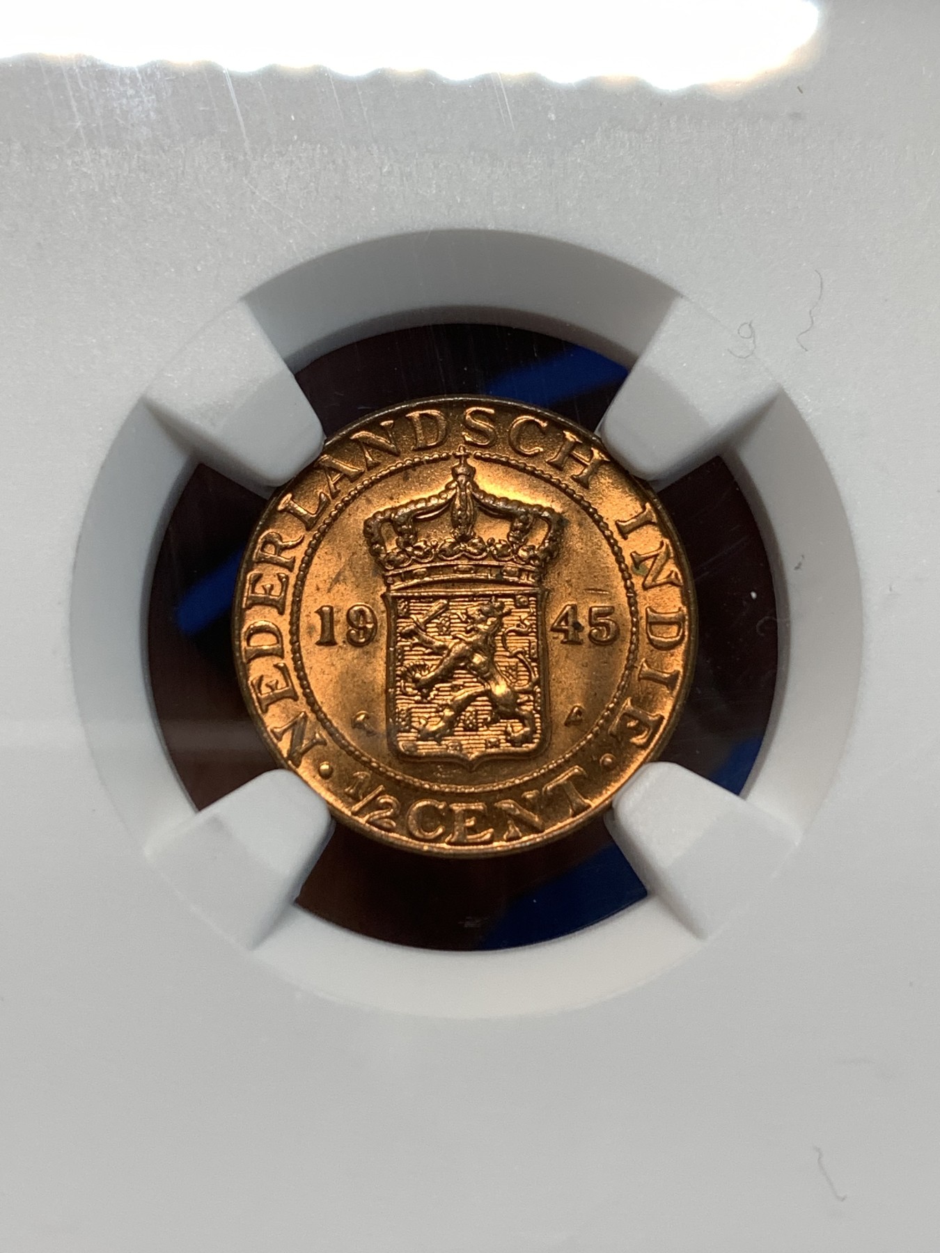 《竞宝斋》第232场-周日，周一 2场 (全场包邮) NGC MS66RD 荷属东印度群岛（今印尼）1945年1/2 半分 铜币 卷拆评级 超高分好品