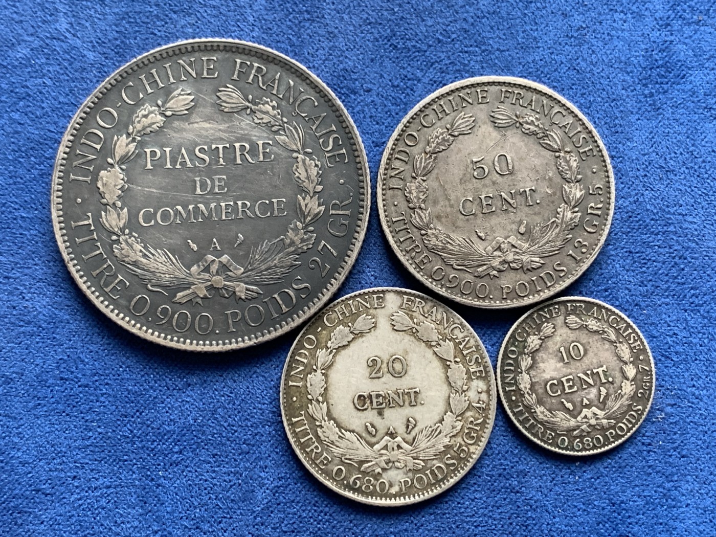 《竞宝斋》第232场-周日，周一 2场 (全场包邮) 4枚一套 法属印支1928年坐洋银币1皮亚斯特+20分+10分(1928年为五珍之一)+1936年50分