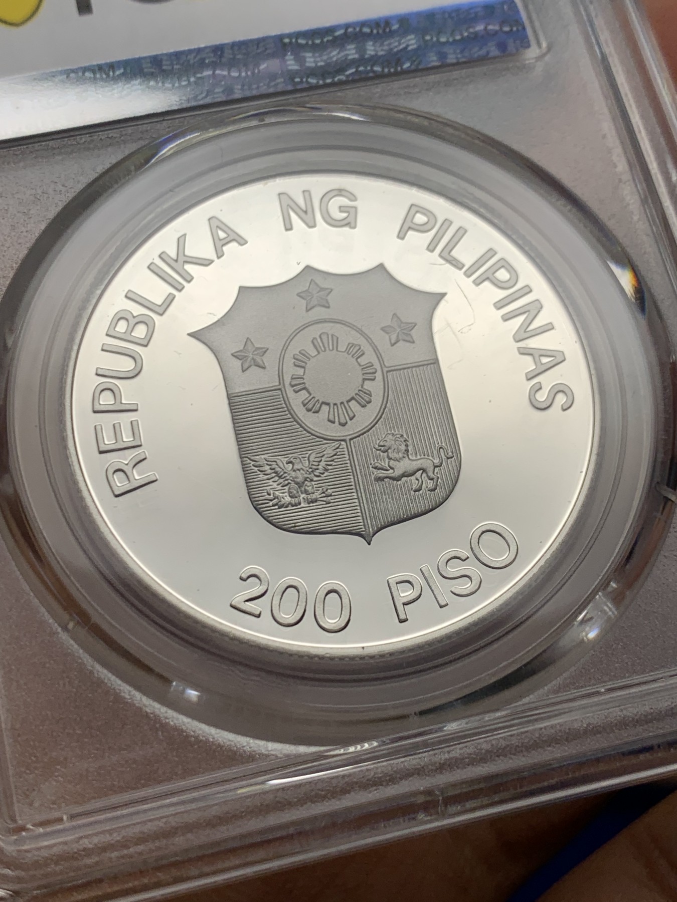 《竞宝斋》第232场-周日，周一 2场 (全场包邮) PCGS金盾 PR69DCAM 菲律宾1987年水牛200比索精制大银币，冠军分