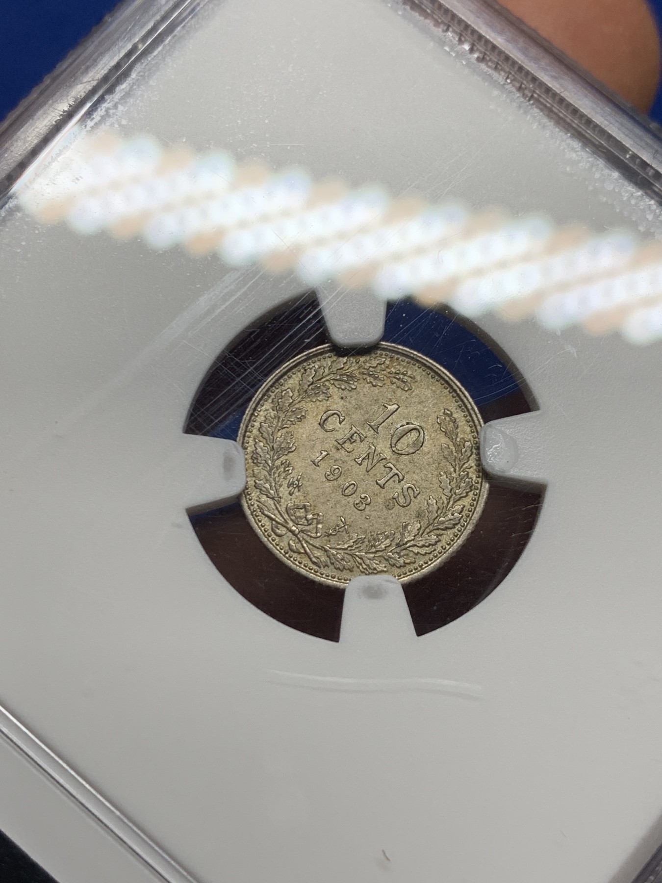 《竞宝斋》第232场-周日，周一 2场 (全场包邮) NGC-MS63 1903年荷兰威廉明娜女王皇冠少女10分银币，稀少乱发版。带皇冠的萝莉头像，高分比长发版更少见。63分参考价125美元