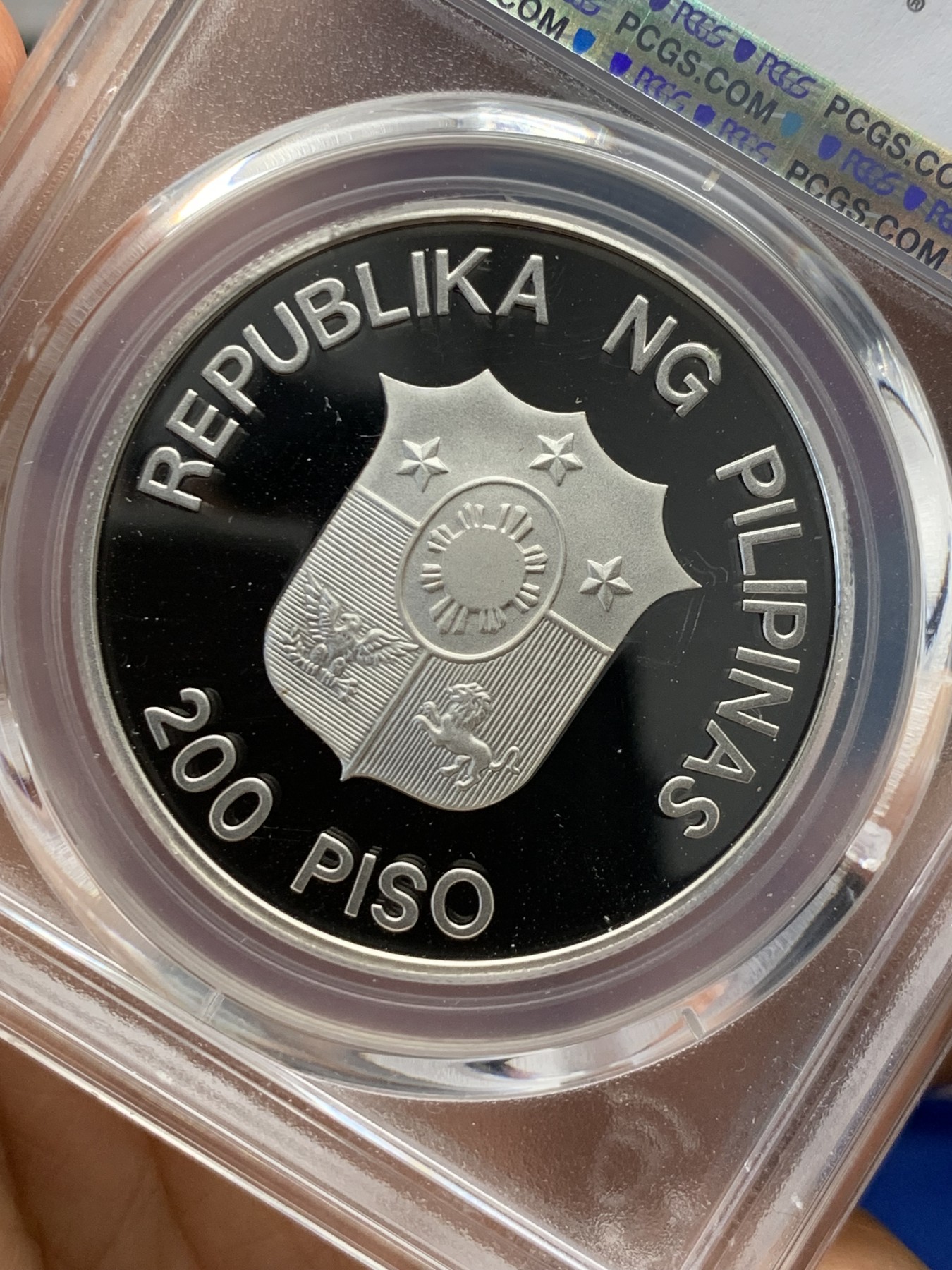 《竞宝斋》第232场-周日，周一 2场 (全场包邮) PCGS金盾 PR69DCAM 菲律宾1987年水牛200比索精制大银币，冠军分