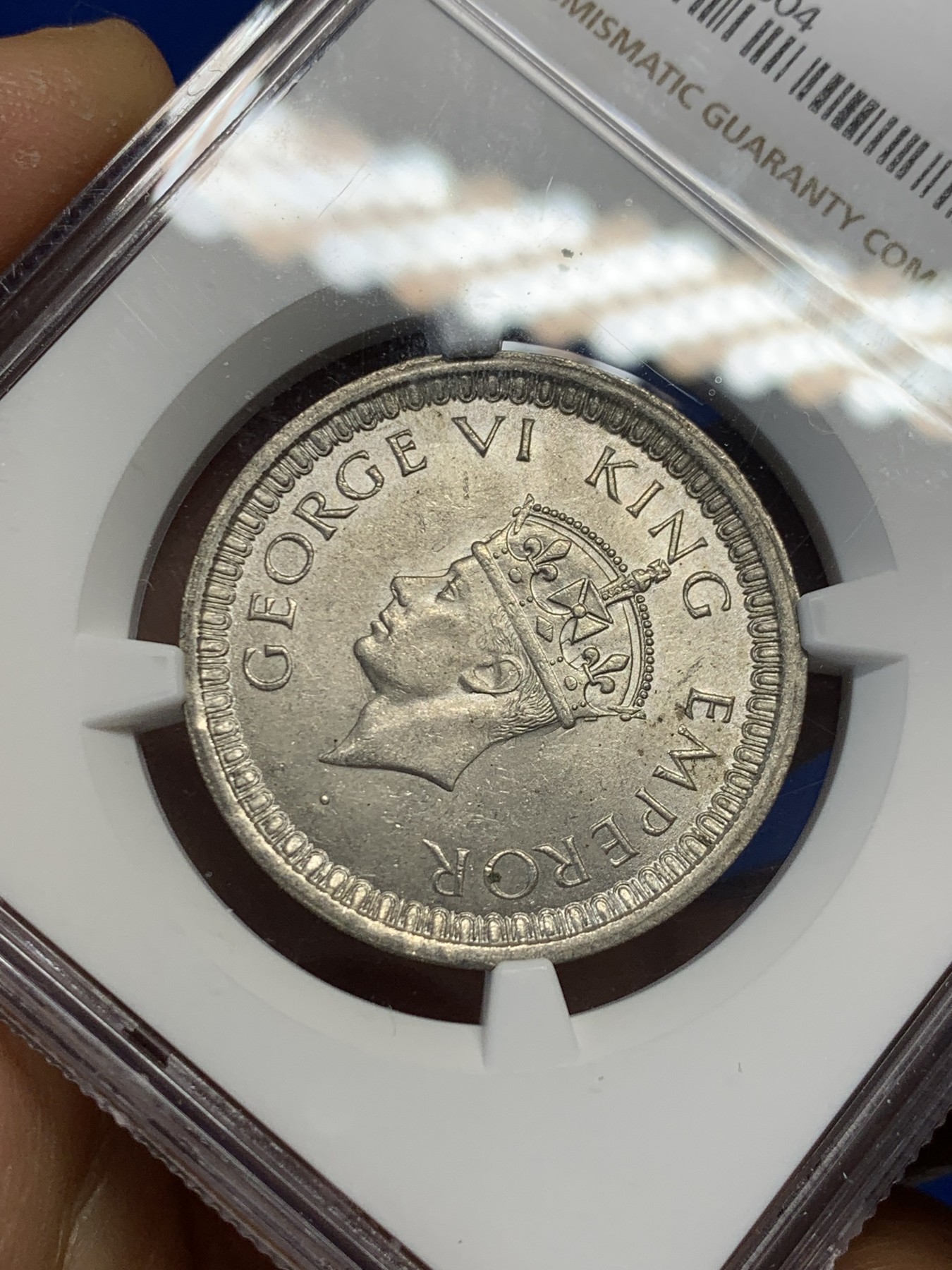 《竞宝斋》第232场-周日，周一 2场 (全场包邮) NGC-MS63 英属印度1942B乔治六世银卢比，霜银转光，花枝细节精美。BU品质，可藏的状态