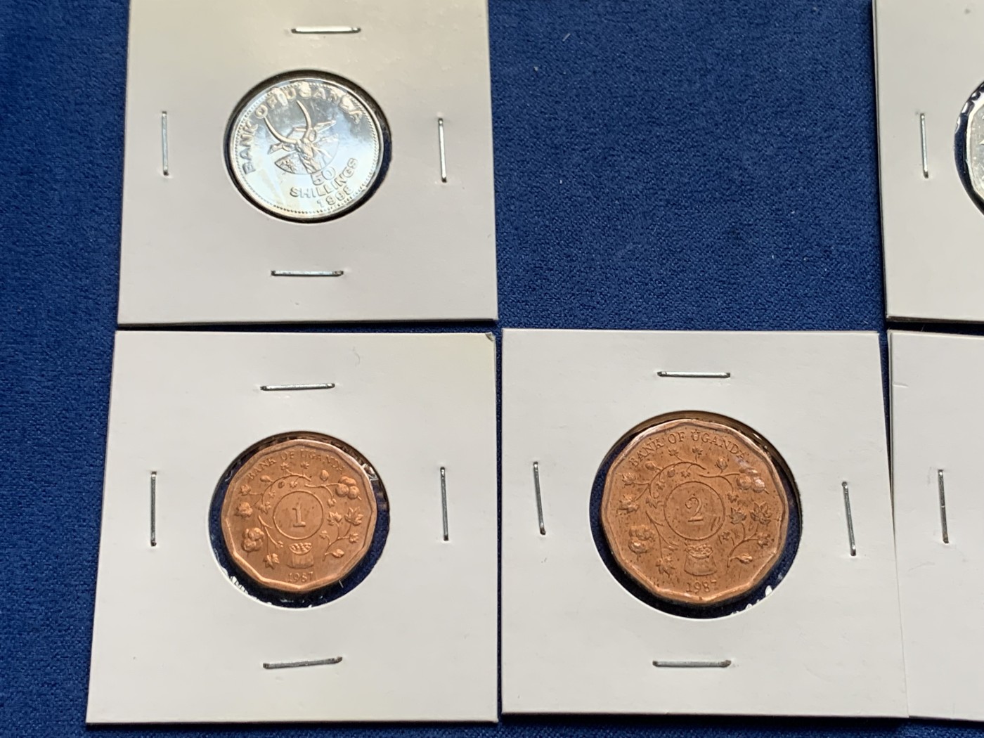 《竞宝斋》第232场-周日，周一 2场 (全场包邮) 8枚一组 乌干达1987年清年份套币4枚+1998年清年份套币4枚