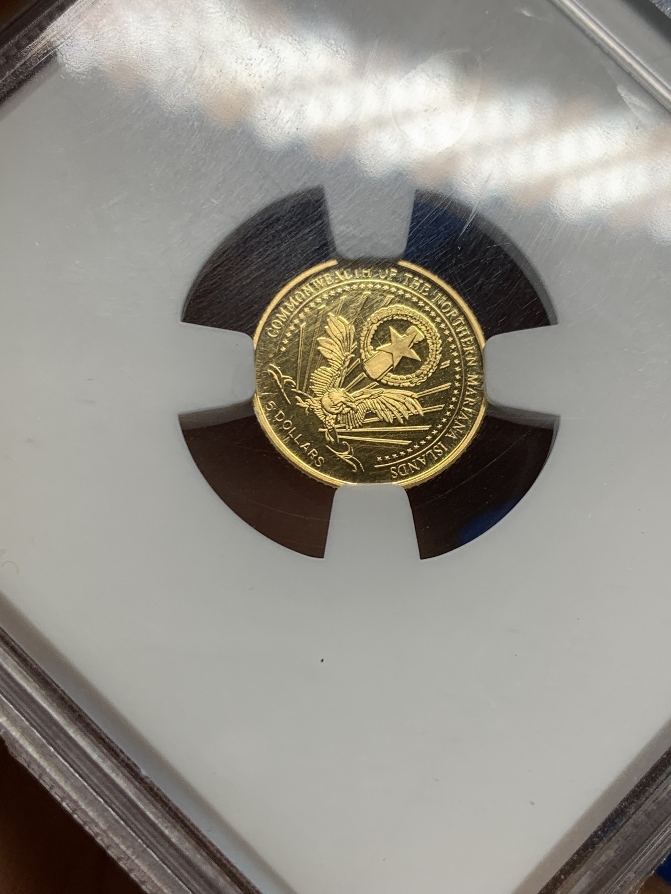 《竞宝斋》第232场-周日，周一 2场 (全场包邮) WPGS PF69 北马里亚纳2004年5元 精制金币 1.25克 999金