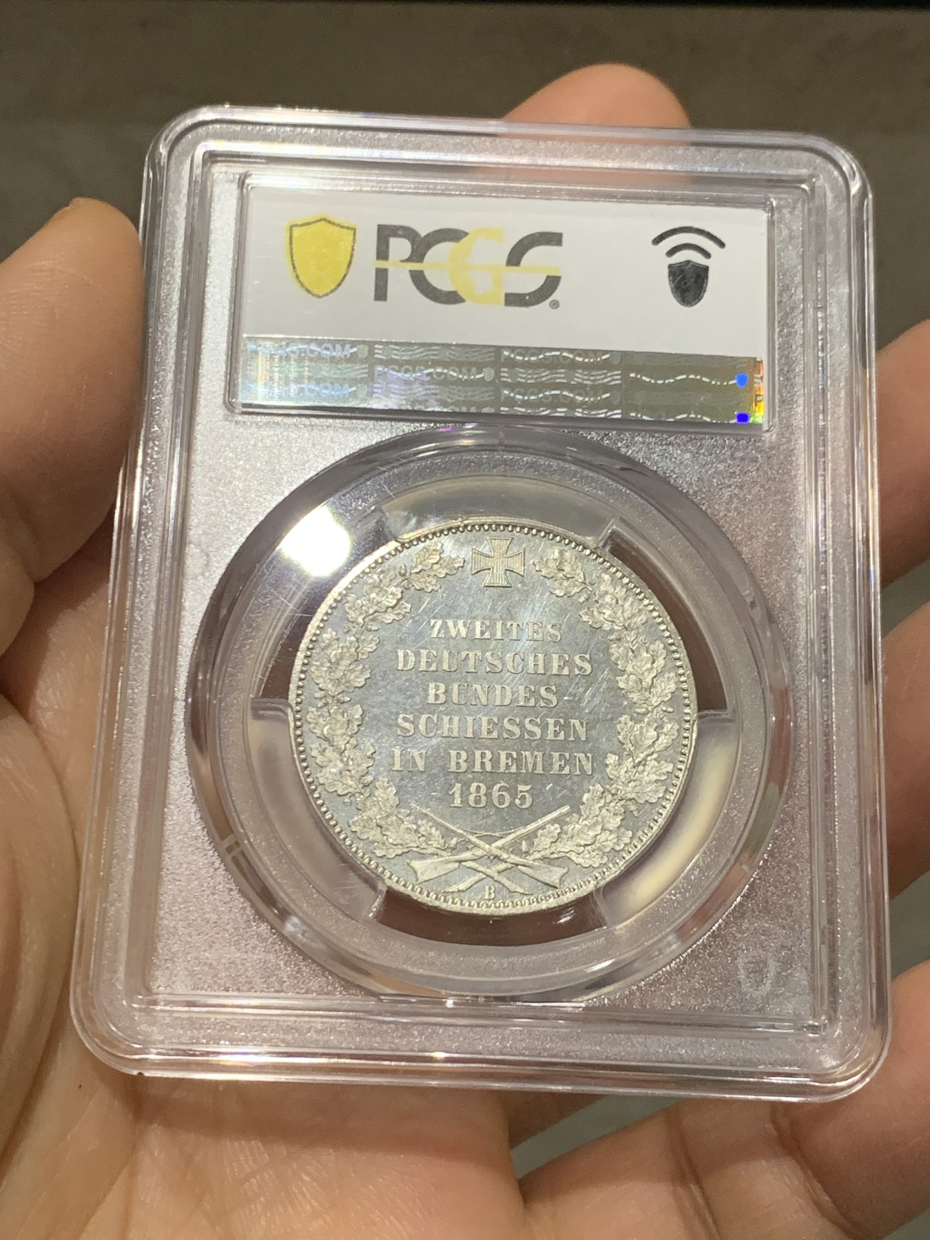 《竞宝斋》第232场-周日，周一 2场 (全场包邮) PCGS MS66PL 德国1865 不来梅自由市射击节泰勒 发行量5万枚，经典的双狮和哥特钥匙徽章，顶级品相，完美镜面状态，p记冠军分