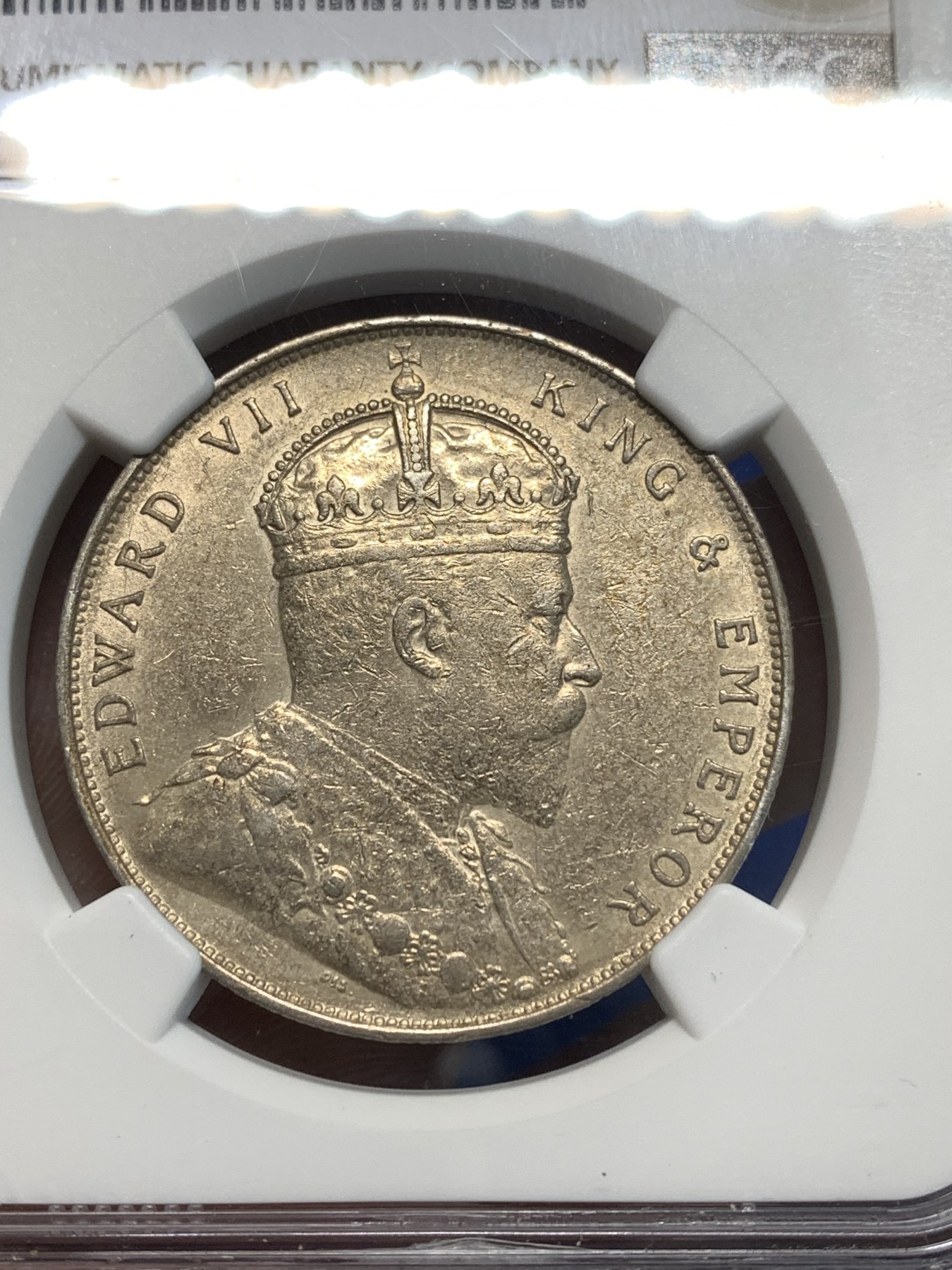 《竞宝斋》第232场-周日，周一 2场 (全场包邮) NGC-AU53 英属海峡1907年 英属海峡殖民地爱德华七世1元银币 淡金彩带光 值得收藏