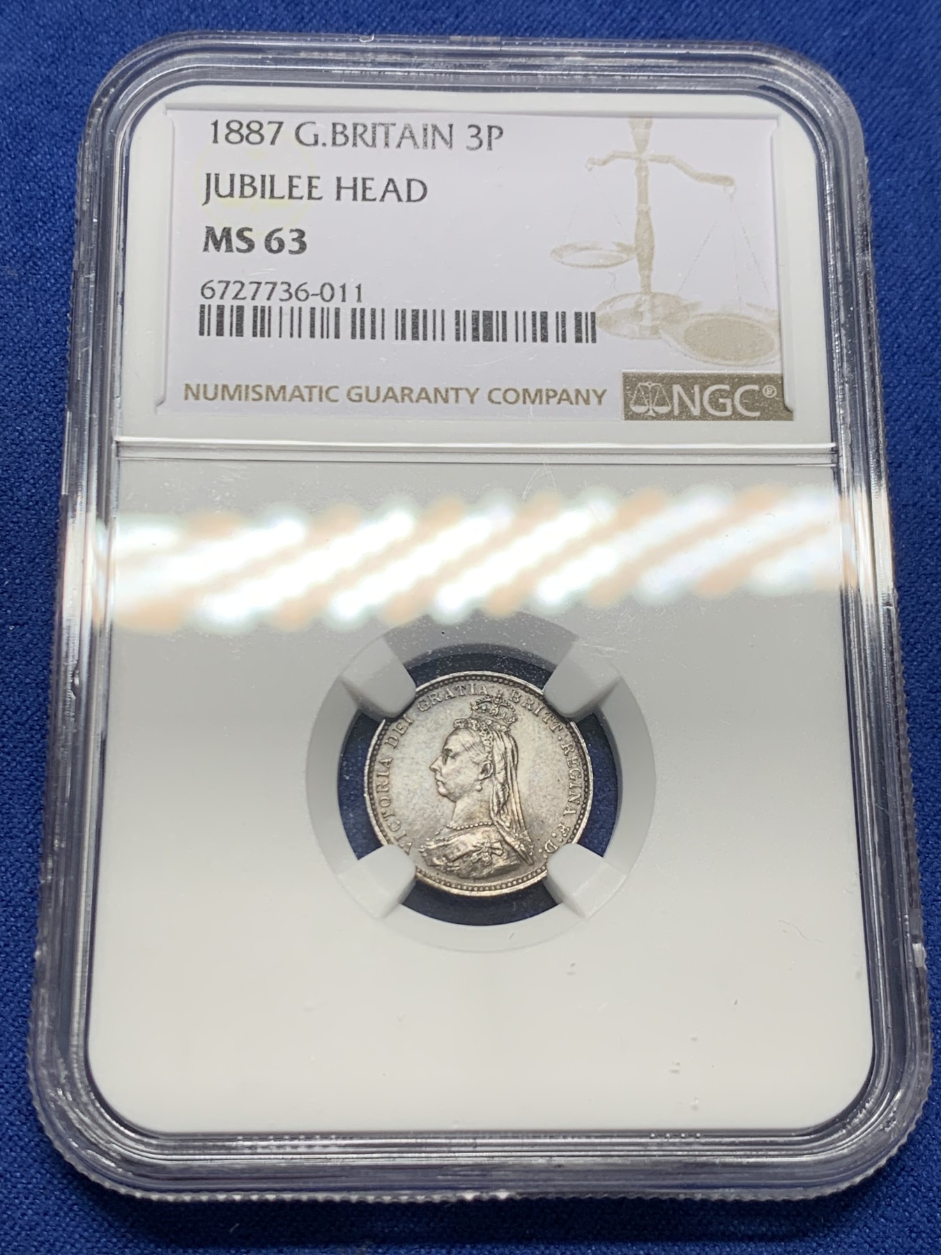 《竞宝斋》第232场-周日，周一 2场 (全场包邮) NGC MS63 1887年维多利亚高冠3便士银币 原味深五彩 带点镜面感 底板丝滑 漂亮的转光