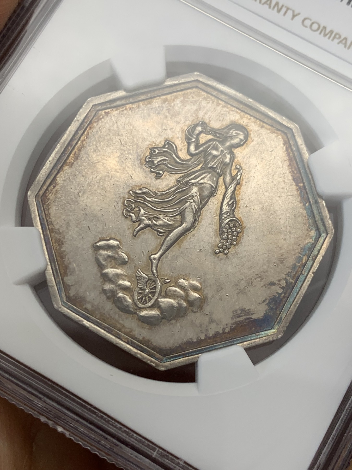 《竞宝斋》第232场-周日，周一 2场 (全场包邮) NGC MS61 法国1843财富保险八角银质代币 轻盈女神踩着独轮车