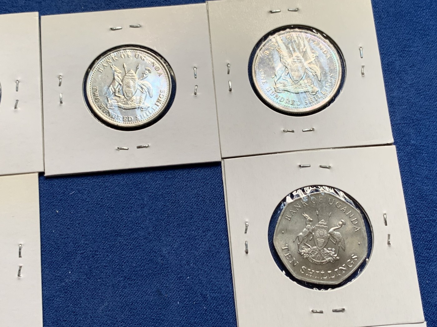 《竞宝斋》第232场-周日，周一 2场 (全场包邮) 8枚一组 乌干达1987年清年份套币4枚+1998年清年份套币4枚