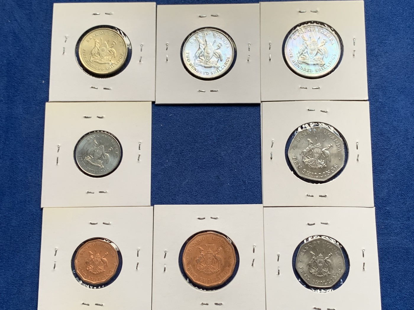 《竞宝斋》第232场-周日，周一 2场 (全场包邮) 8枚一组 乌干达1987年清年份套币4枚+1998年清年份套币4枚