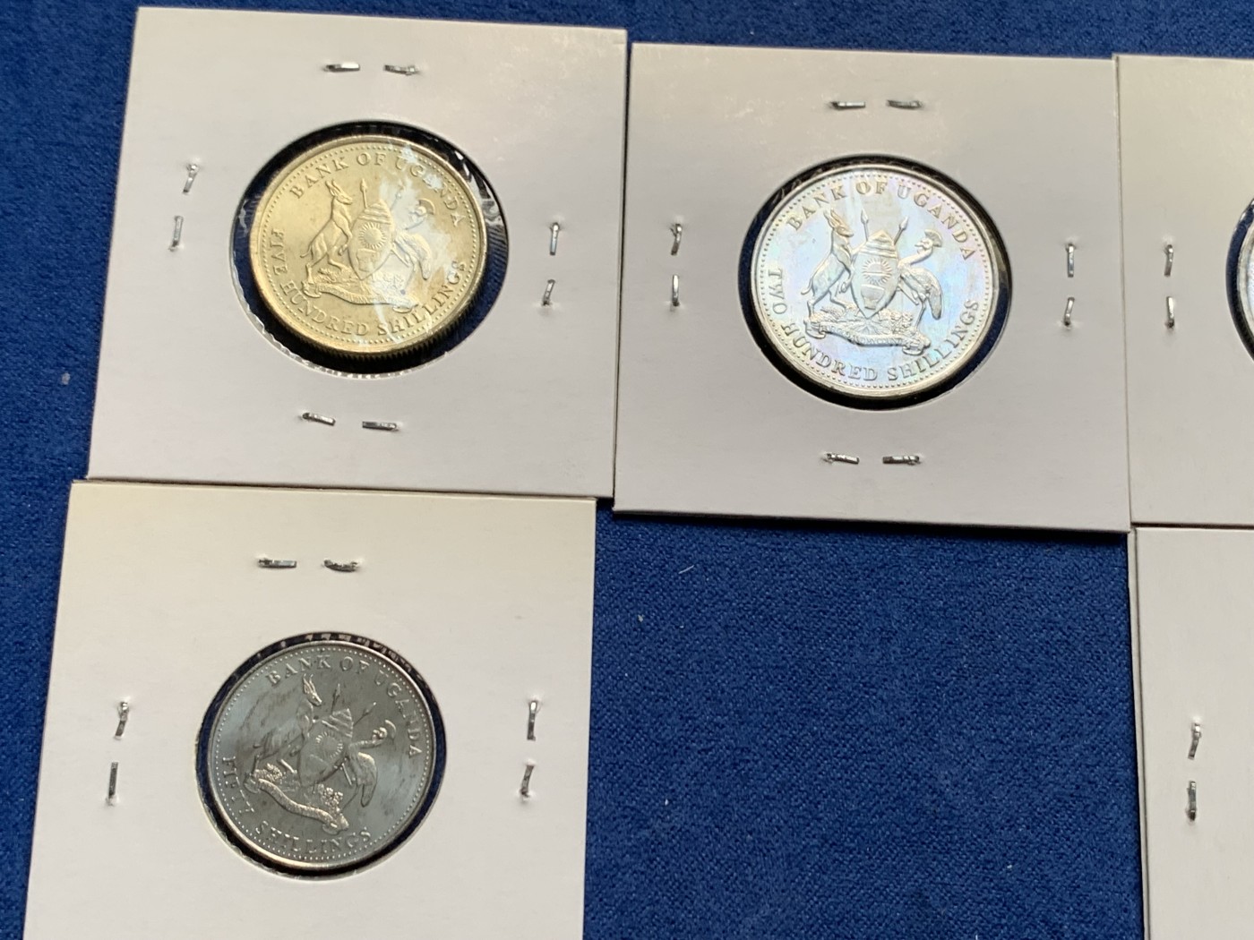 《竞宝斋》第232场-周日，周一 2场 (全场包邮) 8枚一组 乌干达1987年清年份套币4枚+1998年清年份套币4枚