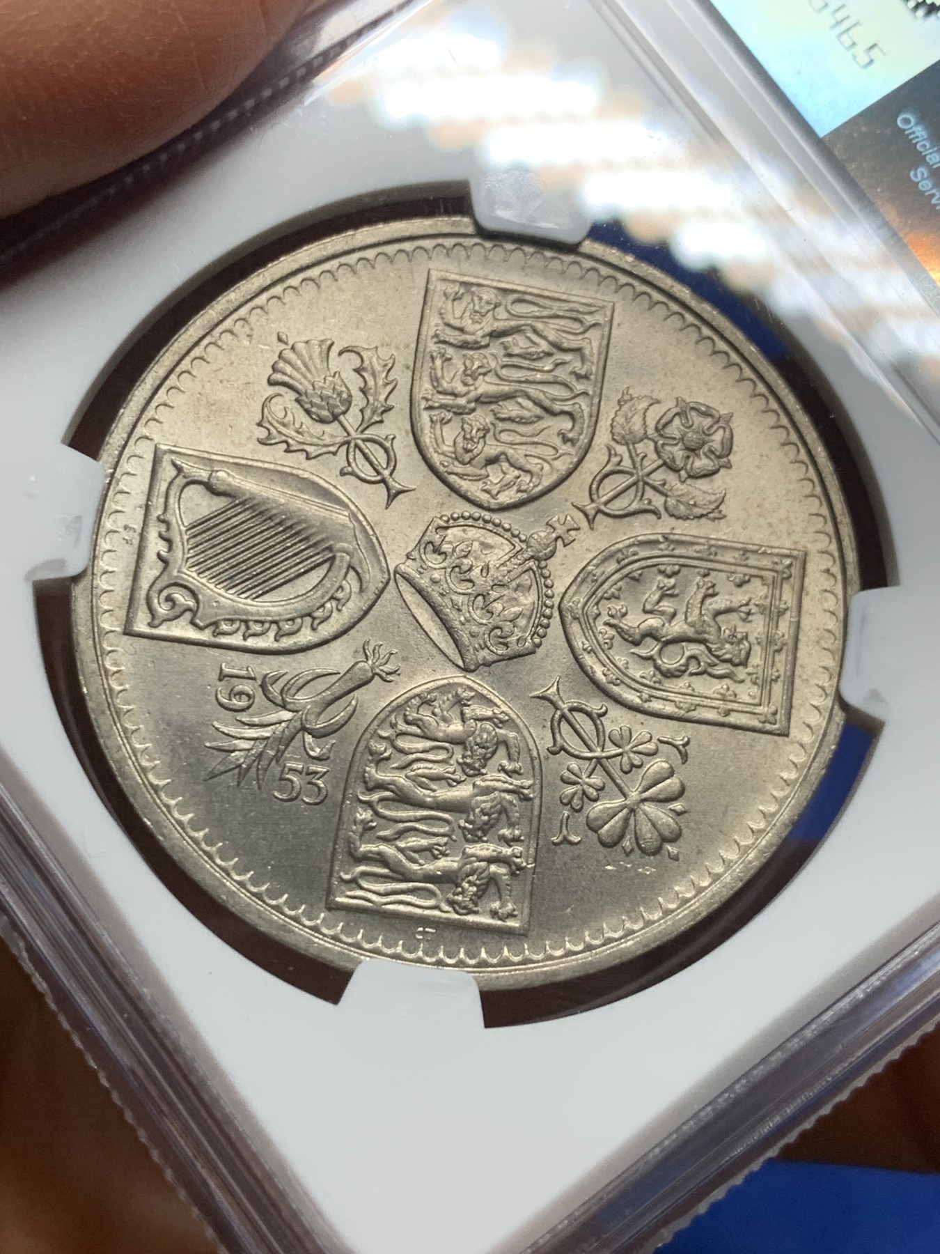 《竞宝斋》第232场-周日，周一 2场 (全场包邮) NGC MS64 英国1953年伊丽莎白二世登基纪念克朗 淡包浆 强光 有点低评了