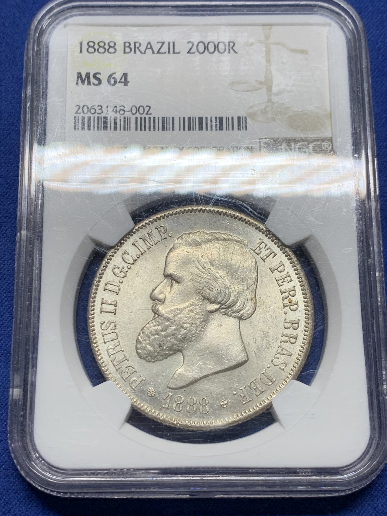 《竞宝斋》第232场-周日，周一 2场 (全场包邮) NGC-MS64 巴西 1888年2000瑞尔 佩德罗二世 大胡子银币 淡黄包浆 MS-64稀有高分一步到位 南美热点品种