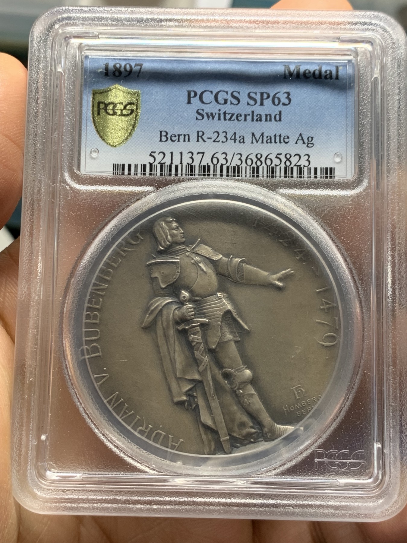 《竞宝斋》第232场-周日，周一 2场 (全场包邮) PCGS SP63 伯尔尼1897射击节银章 原味高浮雕 盒子表面轻微模糊 影响了状态 实物很好