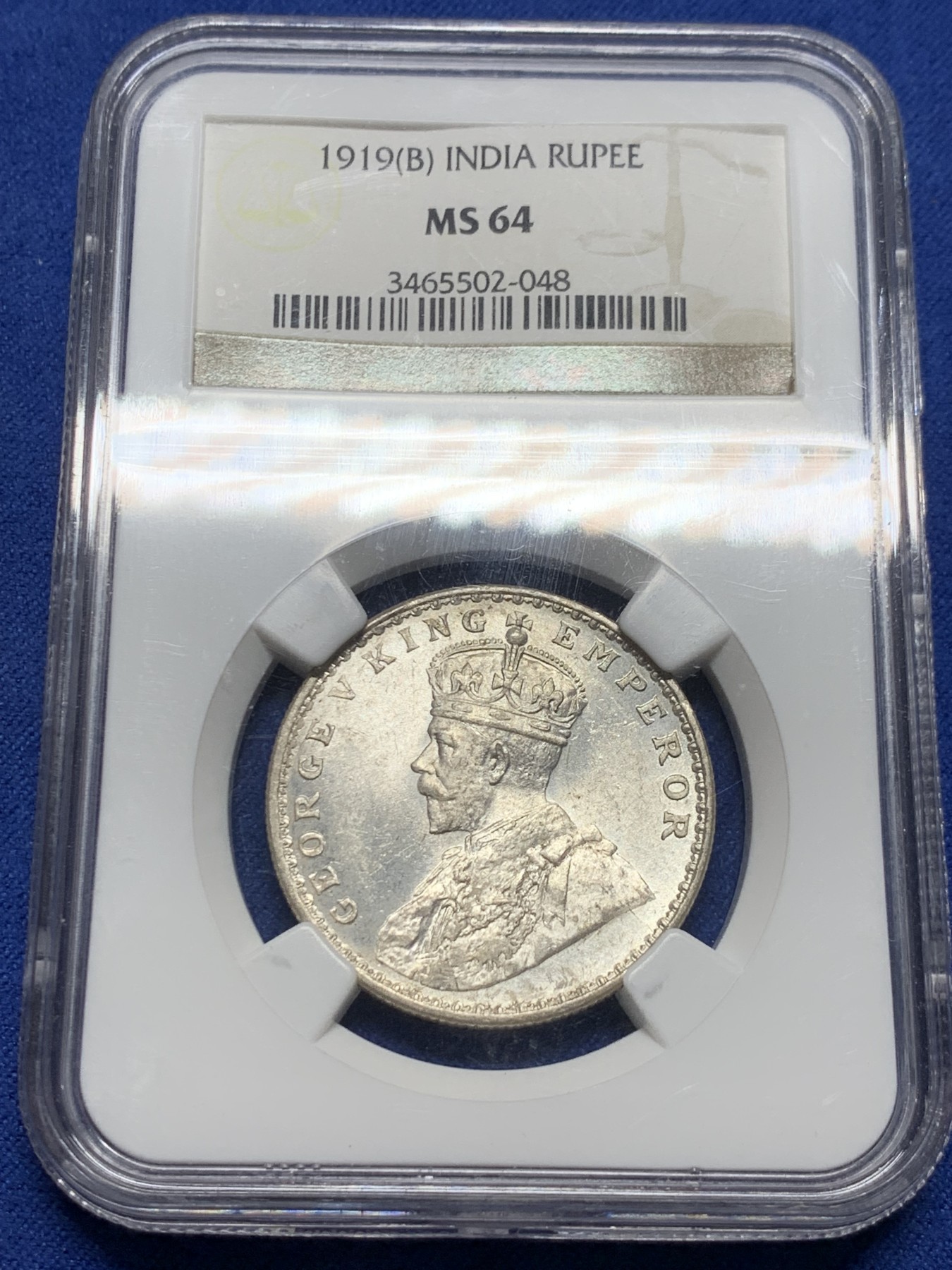 《竞宝斋》第232场-周日，周一 2场 (全场包邮) NGC MS64 英属印度1919年B版孟买厂乔五1卢比银币 高分64