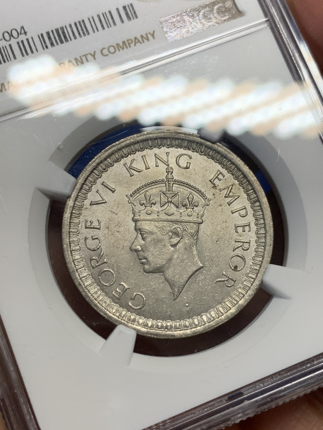 《竞宝斋》第232场-周日，周一 2场 (全场包邮) NGC-MS63 英属印度1942B乔治六世银卢比，霜银转光，花枝细节精美。BU品质，可藏的状态