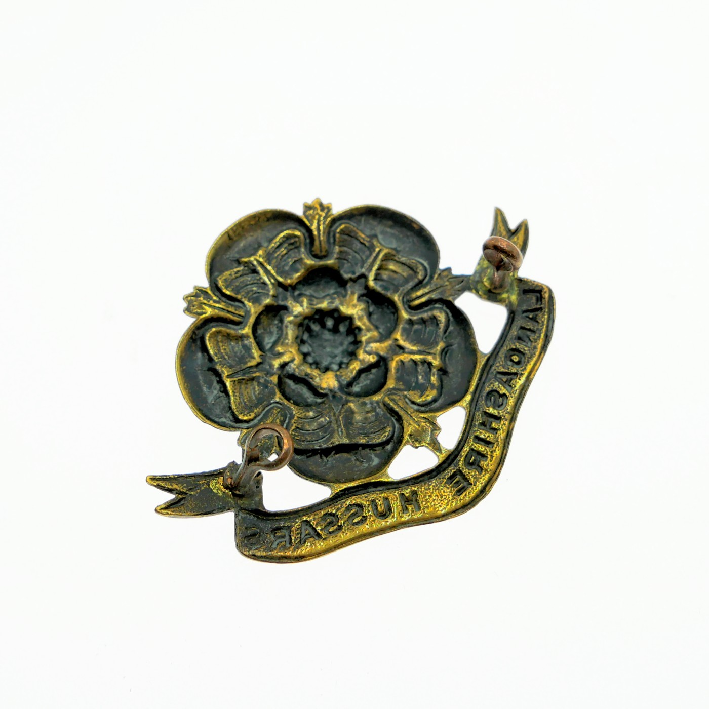 勋章奖章交易所1月13日拍卖 英国兰开夏郡骠骑兵团铜帽徽，1798年成立，参加过布尔战争，一战二战