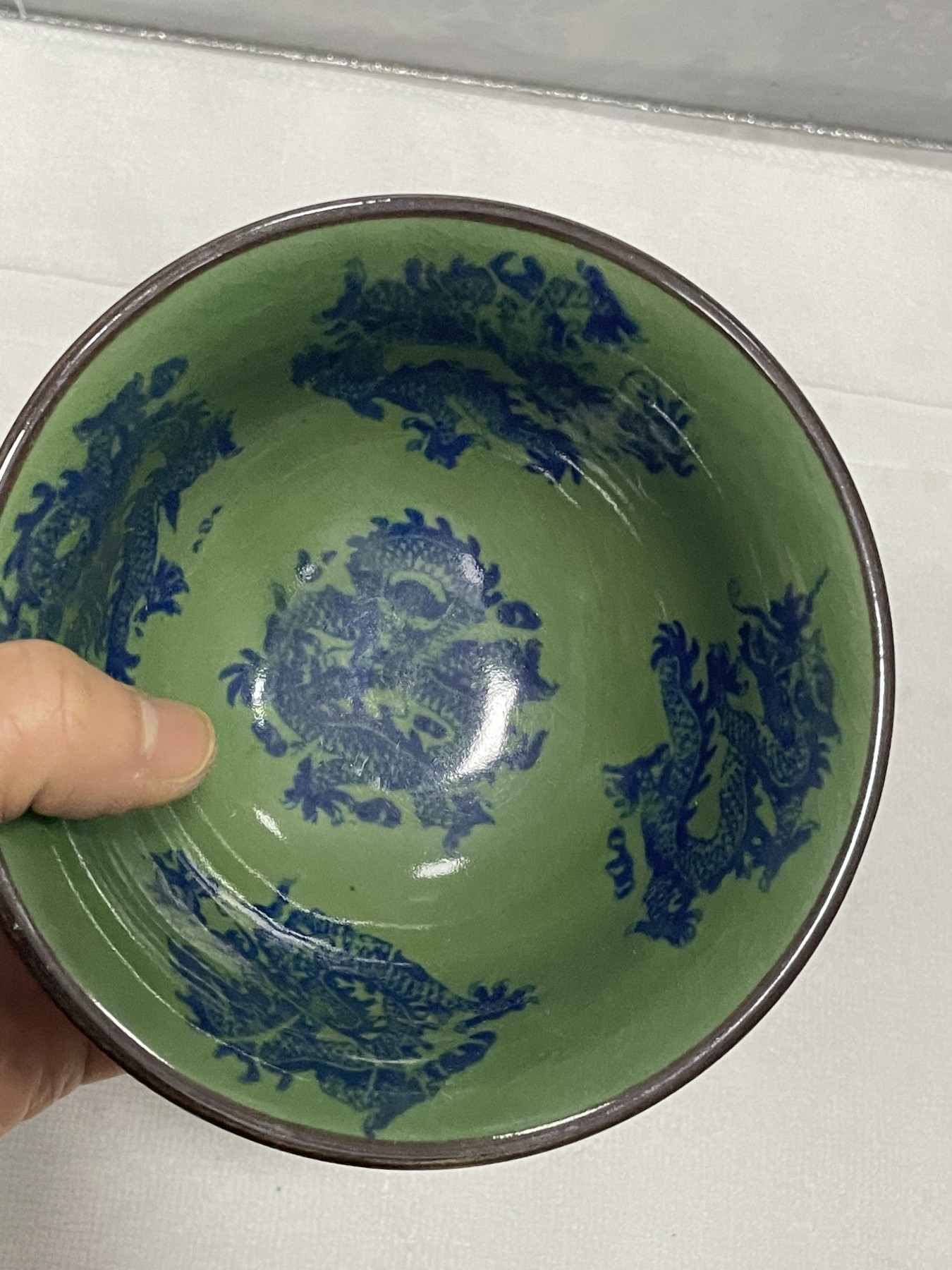 第21场钱币纸币小人书、连环画、瓷器专场 绿釉九龙碗一件