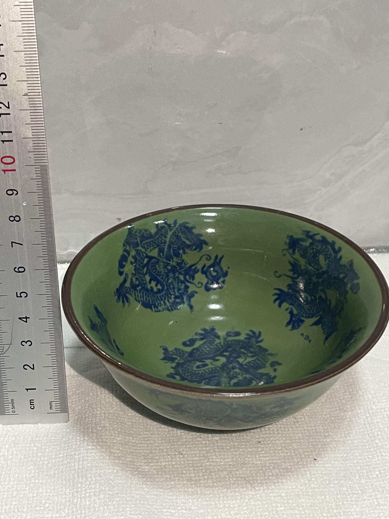 第21场钱币纸币小人书、连环画、瓷器专场 绿釉九龙碗一件