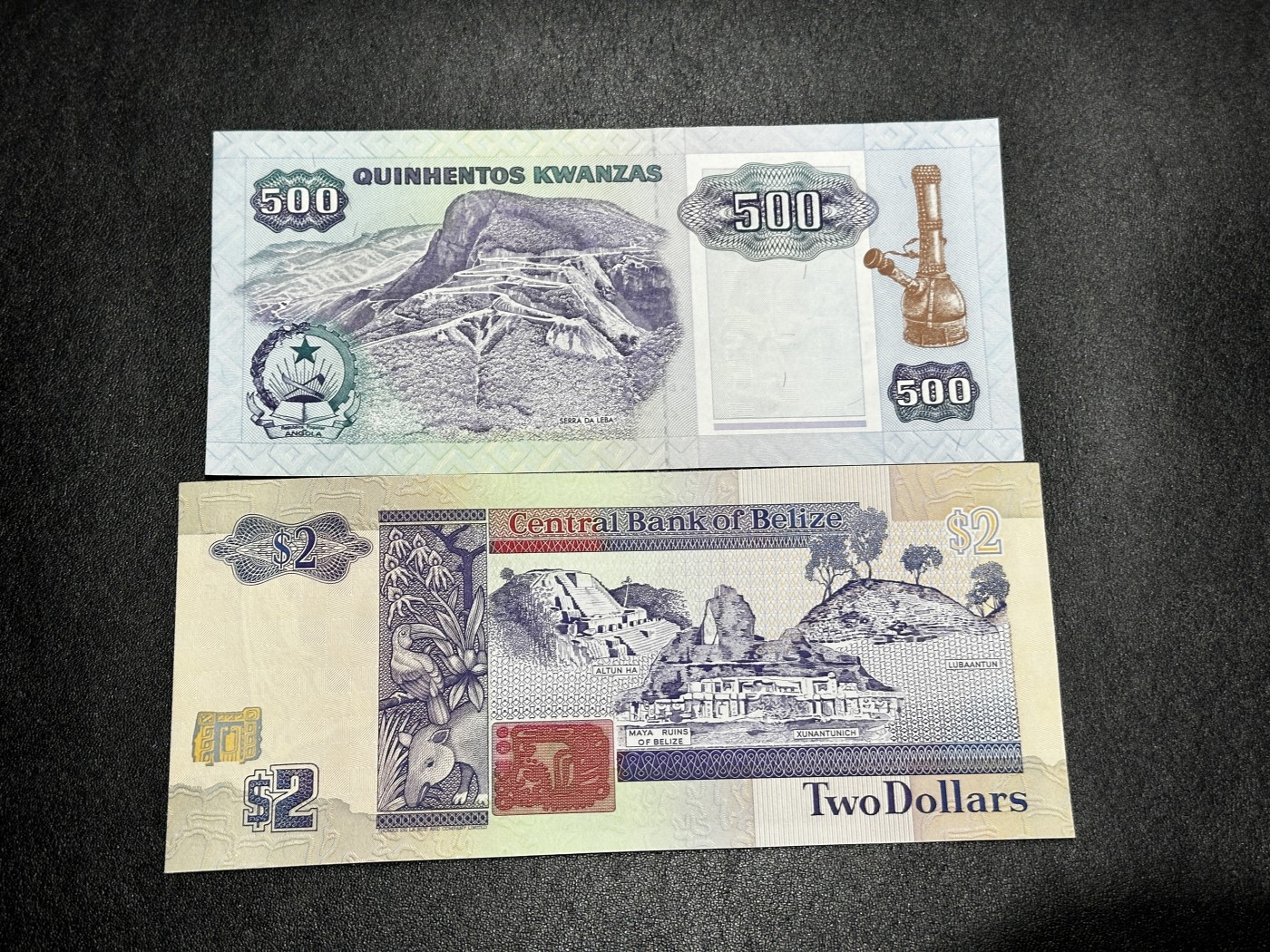 《外钞收藏家》第三百二十九期 安哥拉500+伯利兹2刀 两张一起 全新UNC