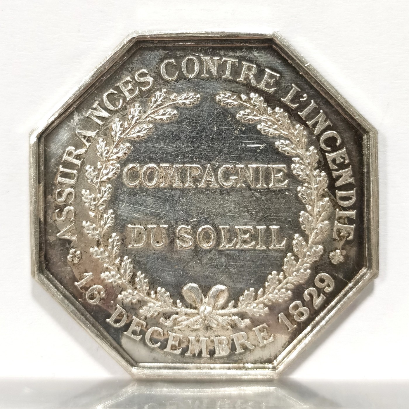 博洋堂世界钱币拍卖第060期（全场包邮） 太阳神八角Jeton银质代币，重19.3G，直径对边36.3mm，丰饶角，太阳公司火灾保险，浮雕感强，很漂亮的一枚八角