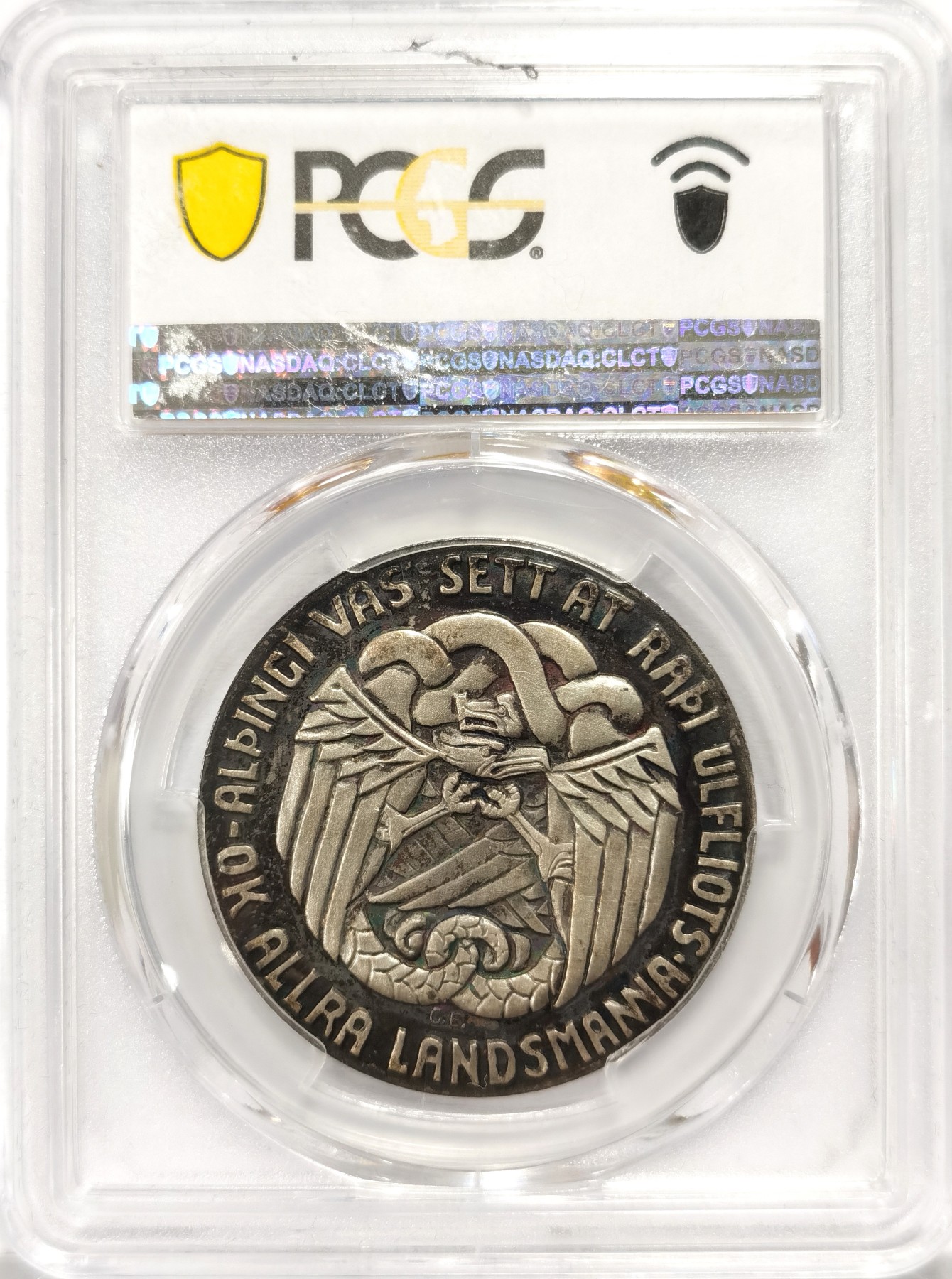 博洋堂世界钱币拍卖第060期（全场包邮） 冰岛1930年5克朗银币，PCGS-MS64。正面为冰议会阿尔庭千年历史立法者乌尔弗洛，背面图案是龙“德雷基”和老鹰“甘穆尔”交织在一起，面值在币的侧面。这3枚硬币被归类在冰岛下面，这枚硬币也被列入珍惜币目录