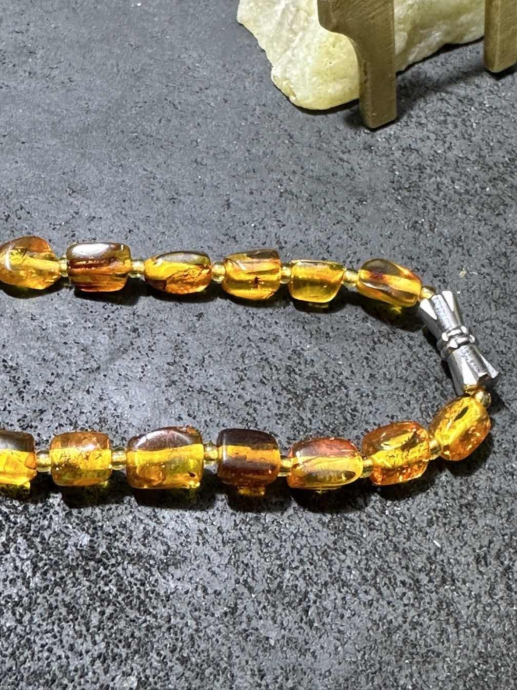 乌克兰花珀随形珠两用链一条，
