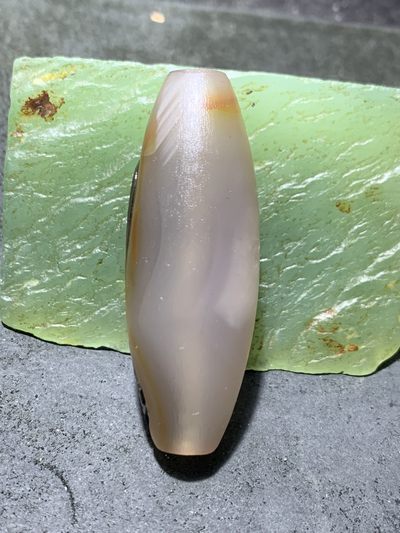 精美亚光高玉化巴西玛瑙手工俏色巧雕一心向佛，禅字桶珠一个！ 精美亚光高玉化巴西玛瑙手工俏色巧雕一心向佛，禅字桶珠一个！