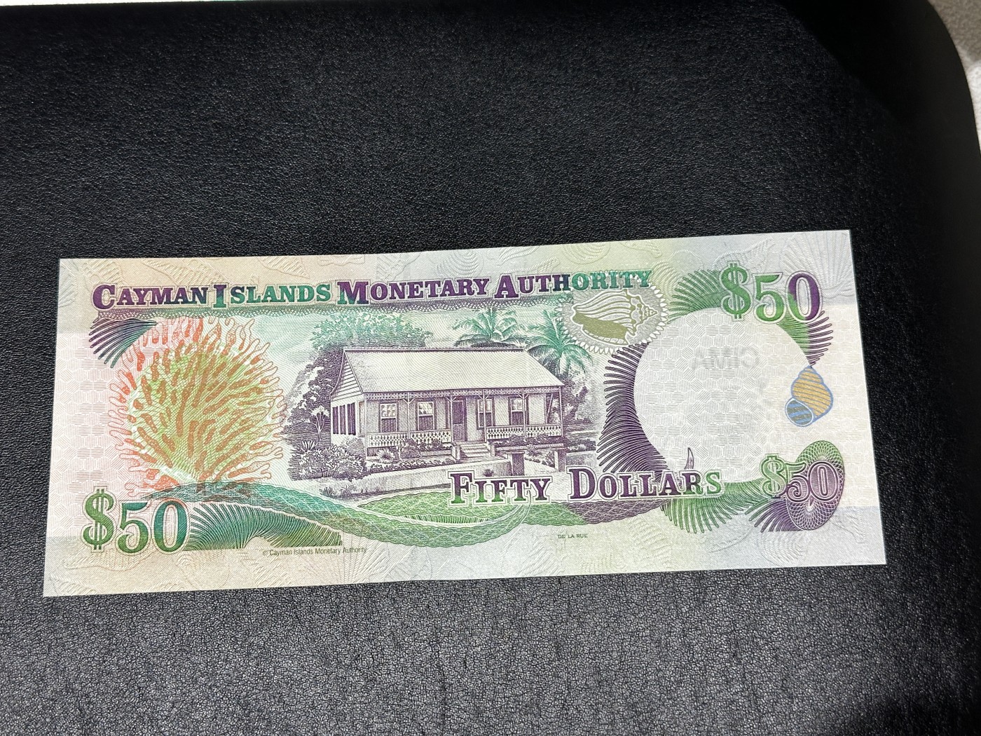 《外钞收藏家》第三百三十二期 加勒比四国专场（伯利兹/巴哈马/巴巴多斯/开曼） 开曼群岛2003年50元（P32） 全新UNC