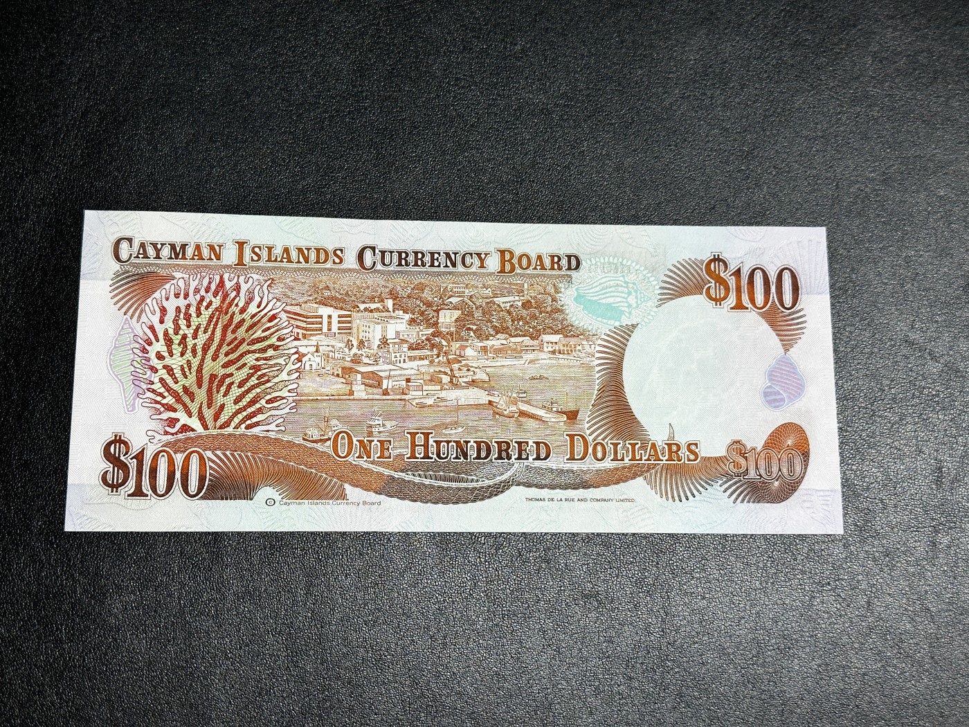 《外钞收藏家》第三百三十二期 加勒比四国专场（伯利兹/巴哈马/巴巴多斯/开曼） 开曼群岛1991年100元（P15），最高面值 全新UNC