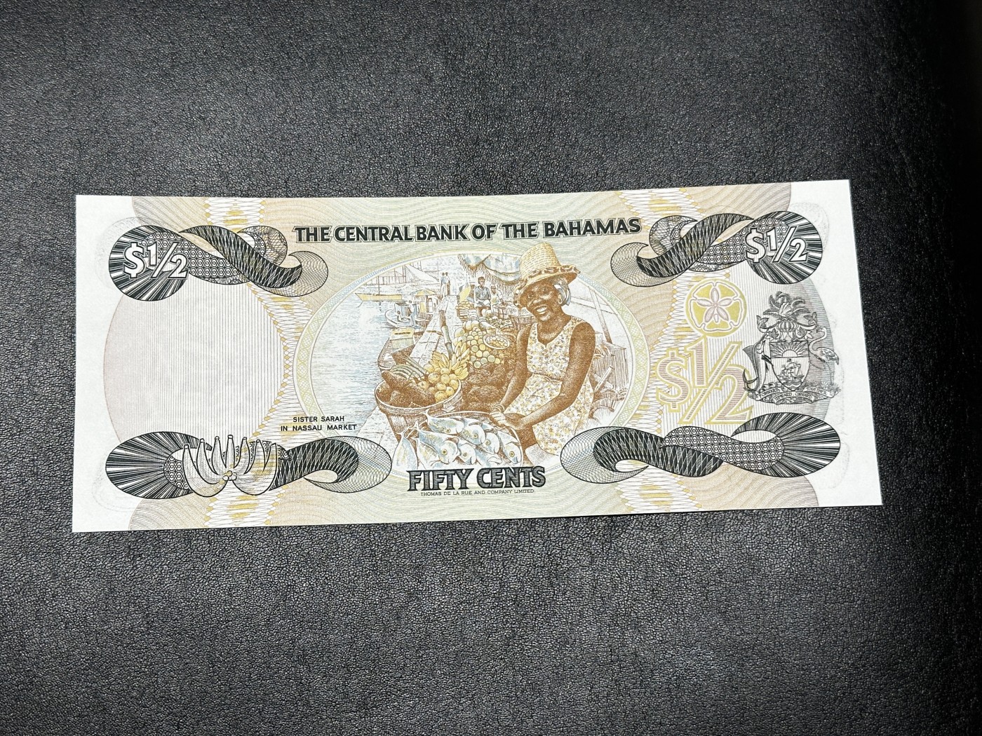 《外钞收藏家》第三百三十二期 加勒比四国专场（伯利兹/巴哈马/巴巴多斯/开曼） 巴哈马1984年1/2元（P42） 全新UNC