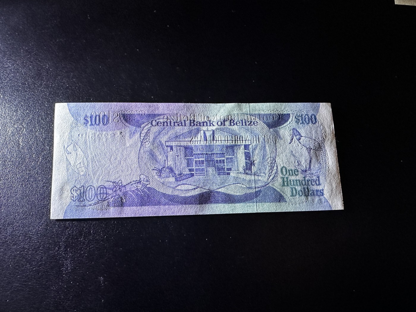 《外钞收藏家》第三百三十二期 加勒比四国专场（伯利兹/巴哈马/巴巴多斯/开曼） 伯利兹1983年100元（P50），最高面值，极少  全新UNC