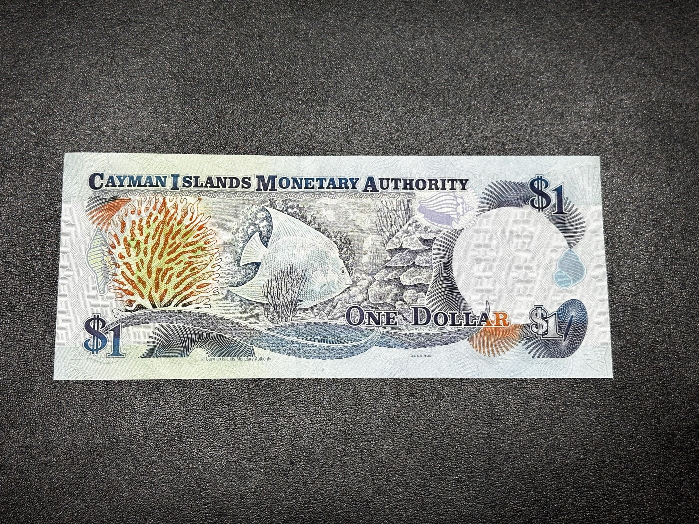 《外钞收藏家》第三百三十二期 加勒比四国专场（伯利兹/巴哈马/巴巴多斯/开曼） 开曼群岛2001年1元（P26） 全新UNC