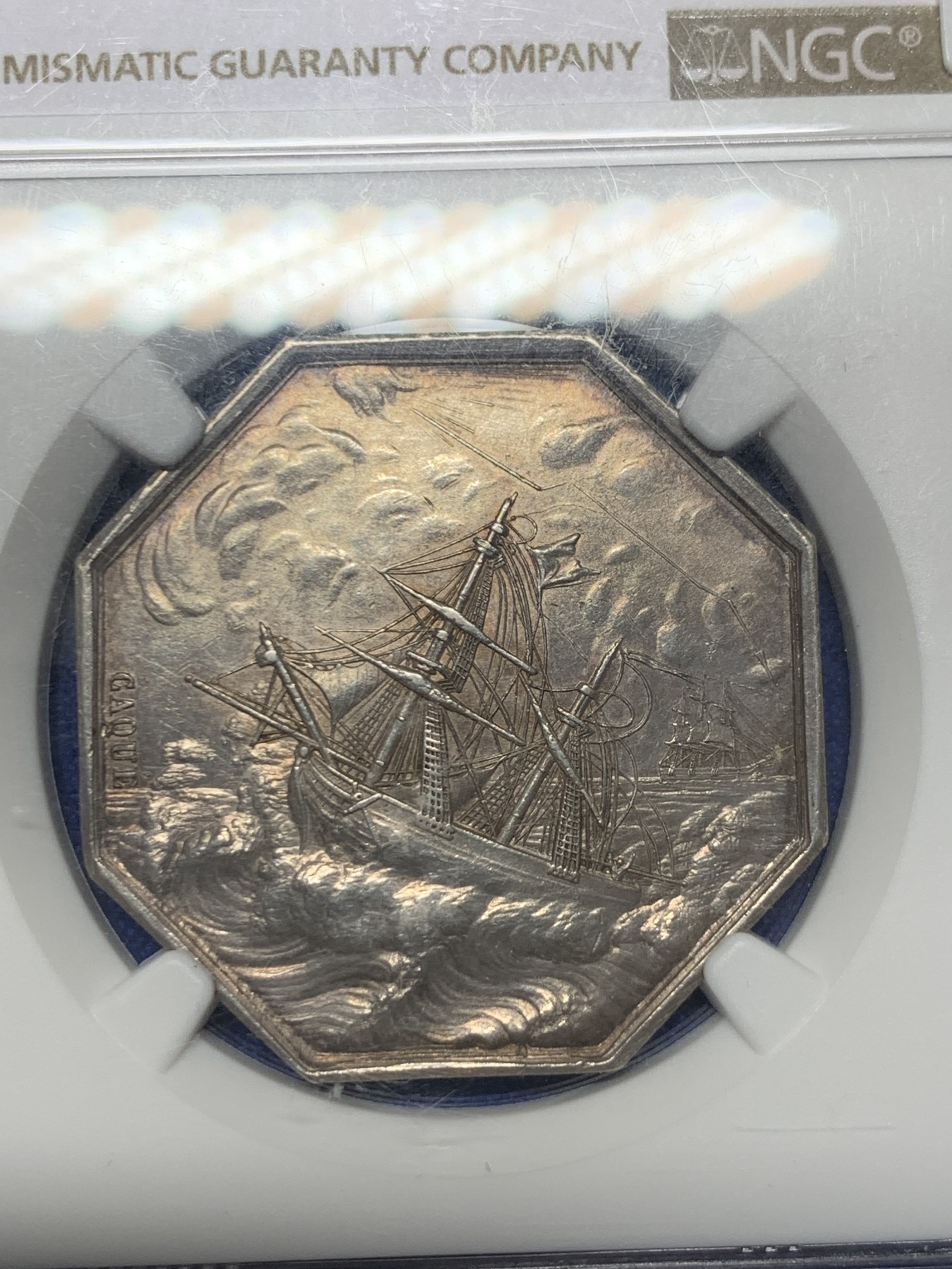 《竞宝斋》第237场- 周日，周一，周二，周日 疯狂4连拍 (全场包邮) NGC-MS61 法国巴黎海上保险公司八角银章，和海妖的背面乘风破浪是同一个作者Caque，略加修改，增加了一艘船，把天上的雨改成了云