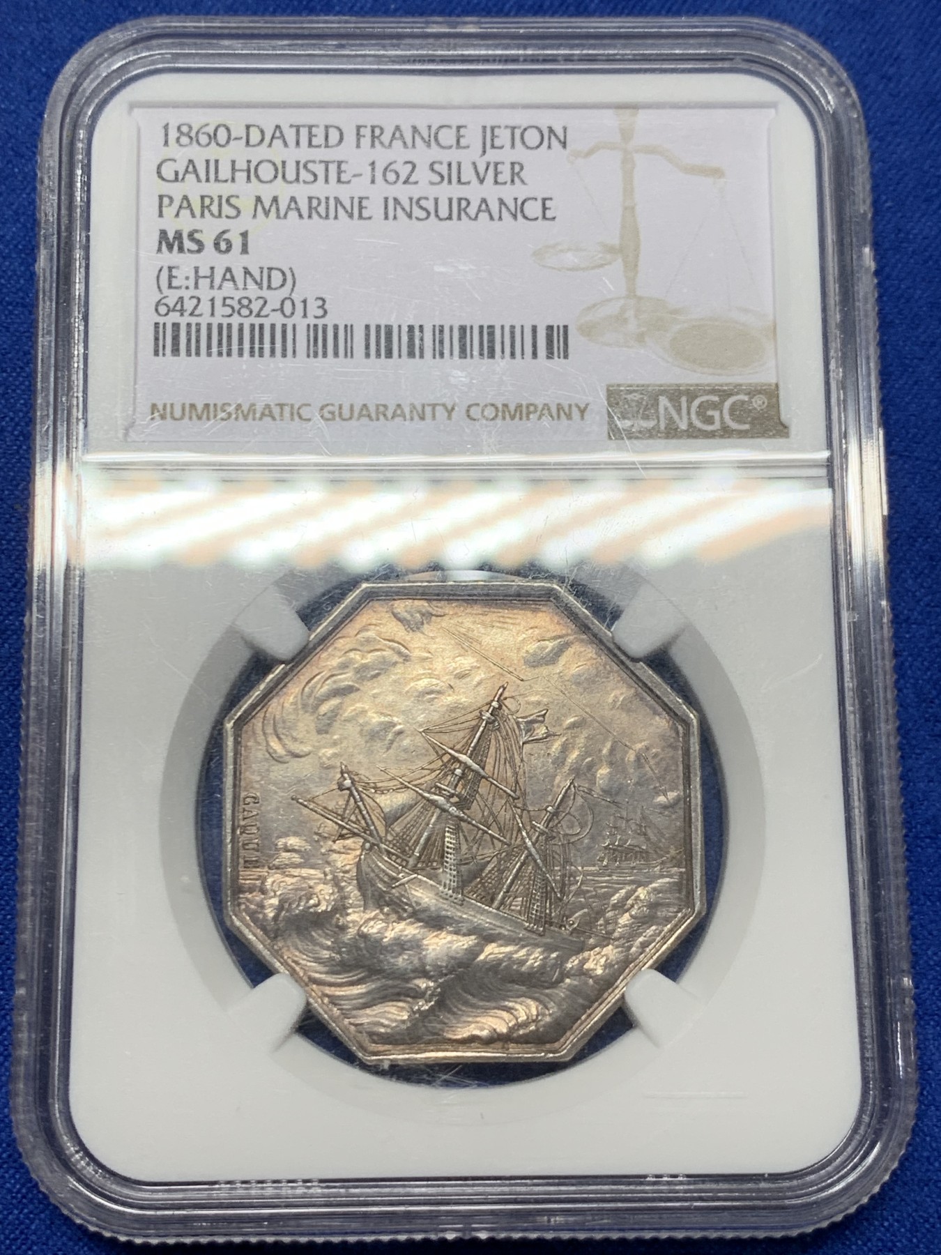 《竞宝斋》第237场- 周日，周一，周二，周日 疯狂4连拍 (全场包邮) NGC-MS61 法国巴黎海上保险公司八角银章，和海妖的背面乘风破浪是同一个作者Caque，略加修改，增加了一艘船，把天上的雨改成了云