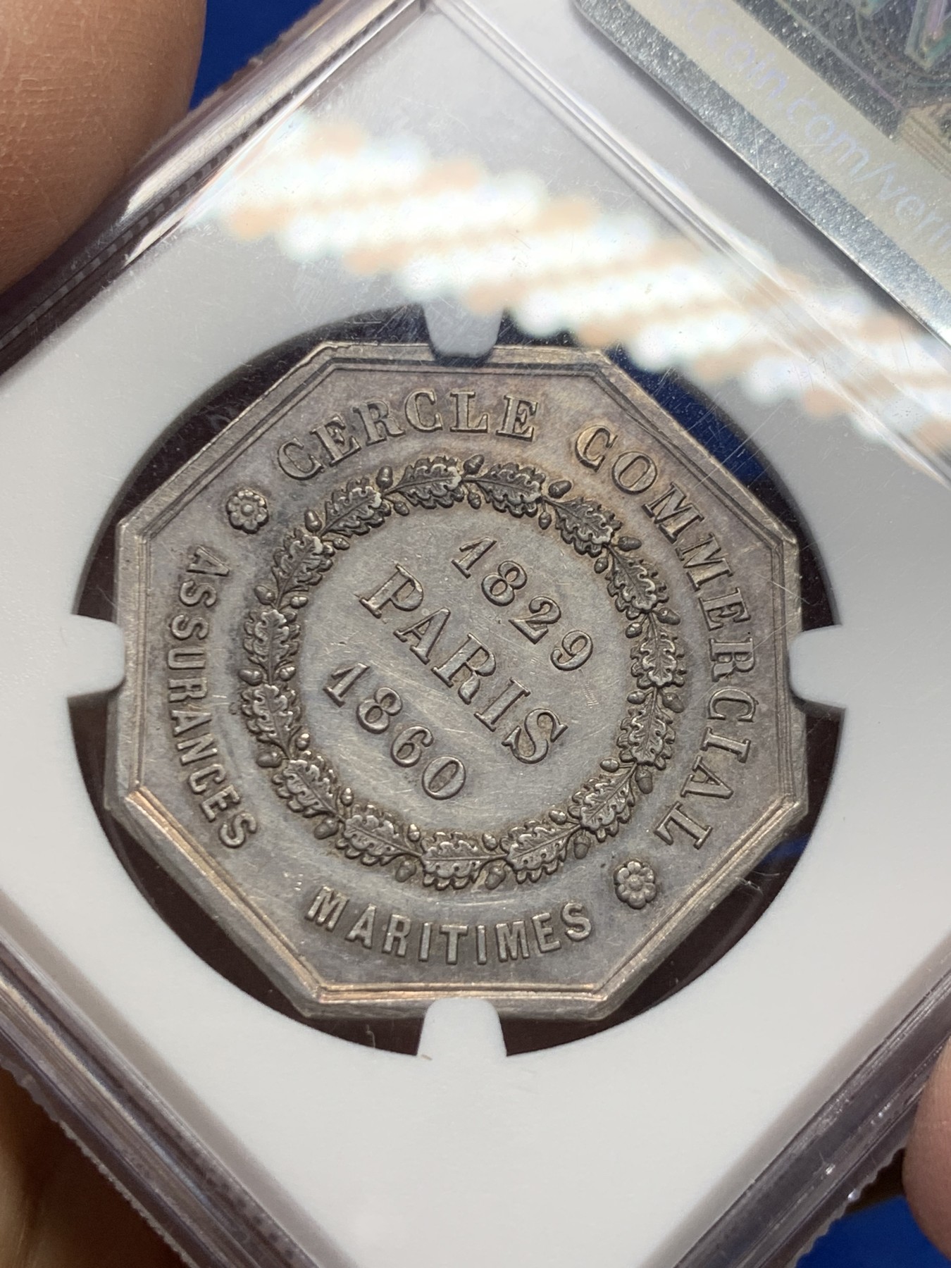 《竞宝斋》第237场- 周日，周一，周二，周日 疯狂4连拍 (全场包邮) NGC-MS61 法国巴黎海上保险公司八角银章，和海妖的背面乘风破浪是同一个作者Caque，略加修改，增加了一艘船，把天上的雨改成了云