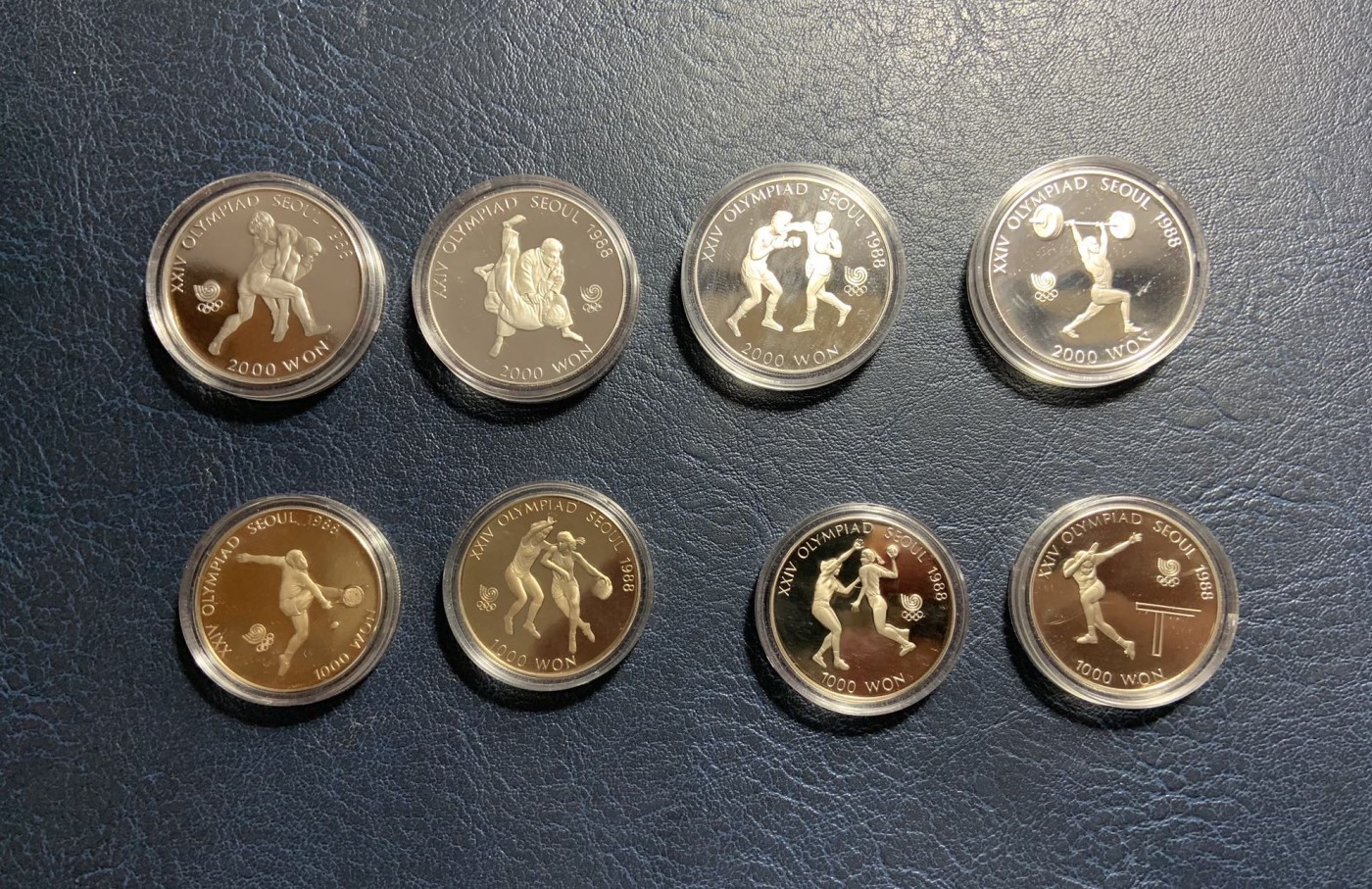 收藏联盟Quantum Auction 第319期拍卖  韩国1988年首尔奥运会精制纪念银和铜币 品相UNC 小盒子内部有黄 