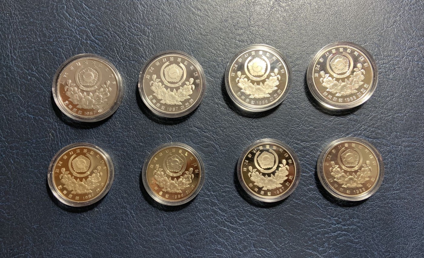 收藏联盟Quantum Auction 第319期拍卖  韩国1988年首尔奥运会精制纪念银和铜币 品相UNC 小盒子内部有黄 