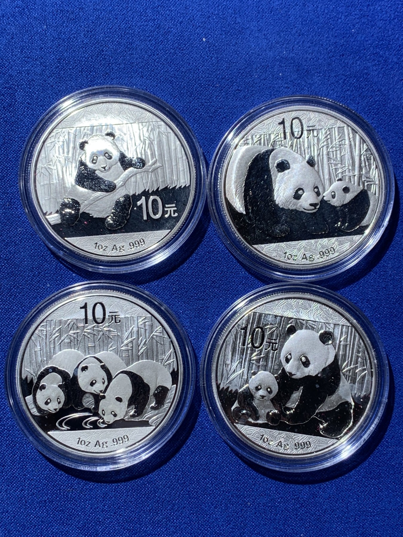 《竞宝斋》第235场-周日，周一，周二，周三 疯狂4连拍 (全场包邮) 2011-2014熊猫银币各一枚，共计四枚，有三张证书，三个银币盒子