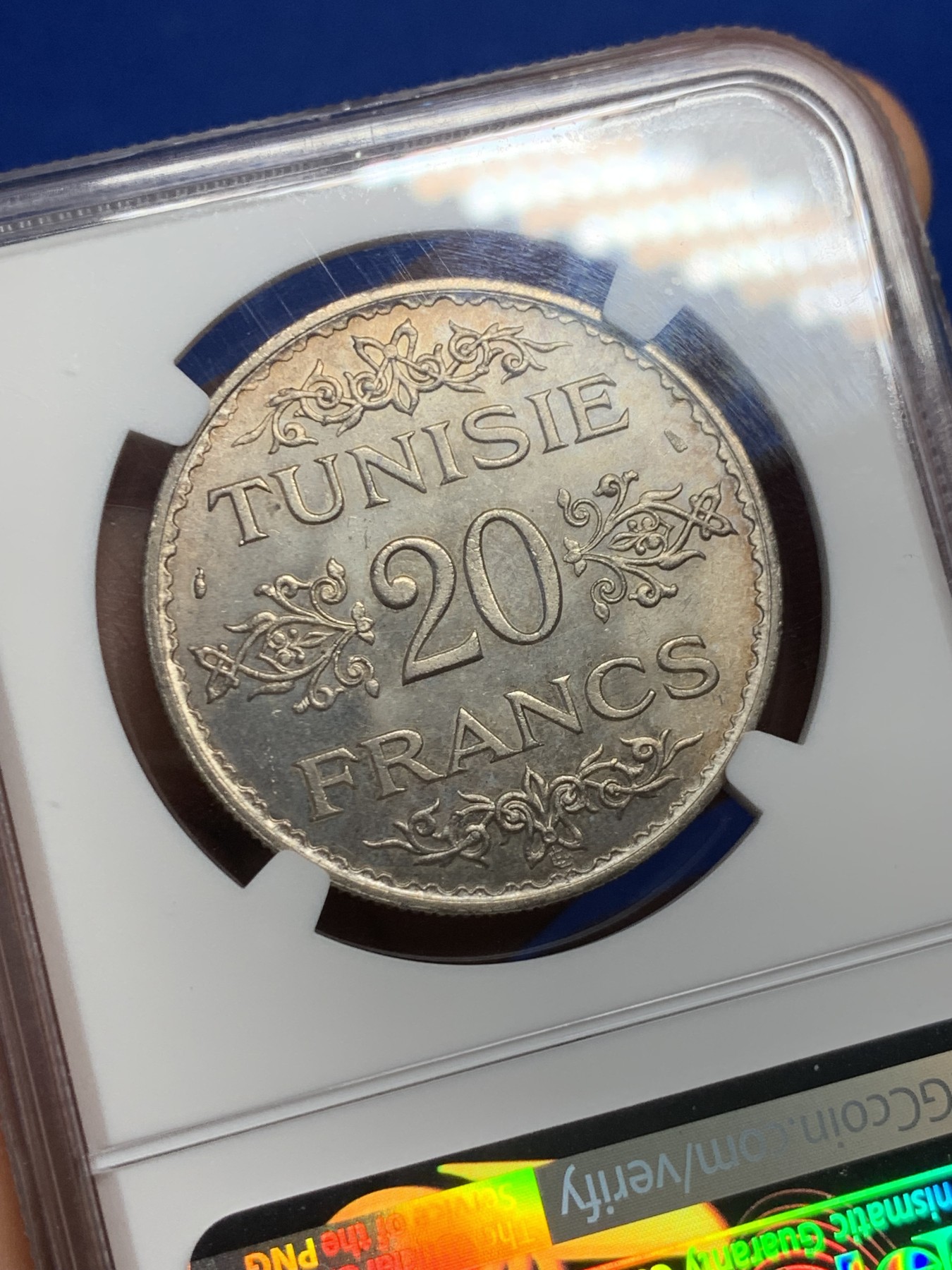 《竞宝斋》第235场-周日，周一，周二，周三 疯狂4连拍 (全场包邮) NGC-MS64 法属突尼斯1934年20法郎银币，突尼斯艾哈迈德二世时期流通的银主币。原汁原味老包浆，包浆醇厚，打制精美，状态一流，高分精品，获得更高评分数目才11枚。