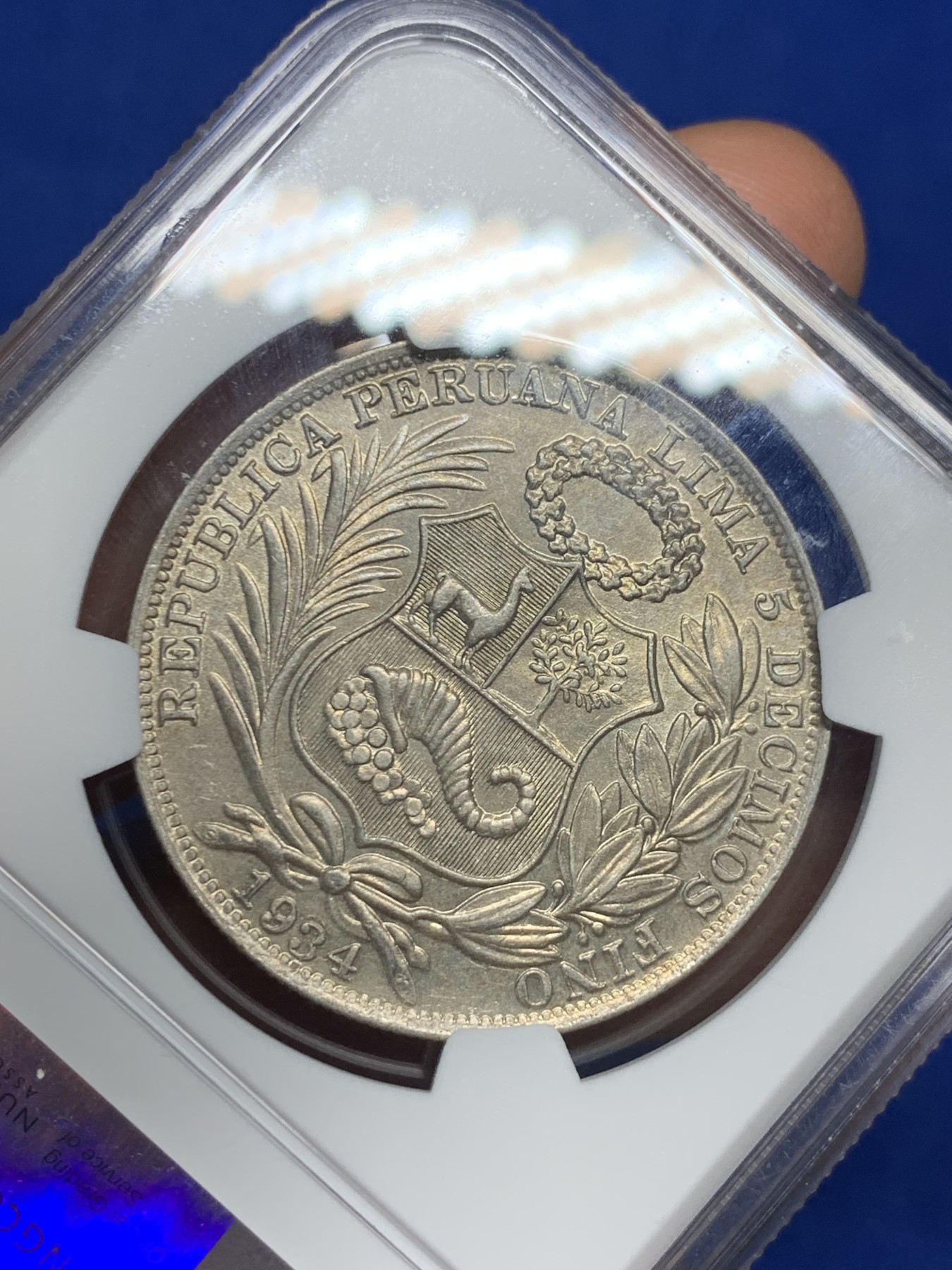 《竞宝斋》第235场-周日，周一，周二，周三 疯狂4连拍 (全场包邮) NGC-AU58 秘鲁1934年坐洋自由女神一索尔银币，原汁原味老包浆，极美黄油彩，状态极佳，非常漂亮，南美洲主币。略为低评，品质和状态绝对不输MS级，获得更高的评分数目才91枚。